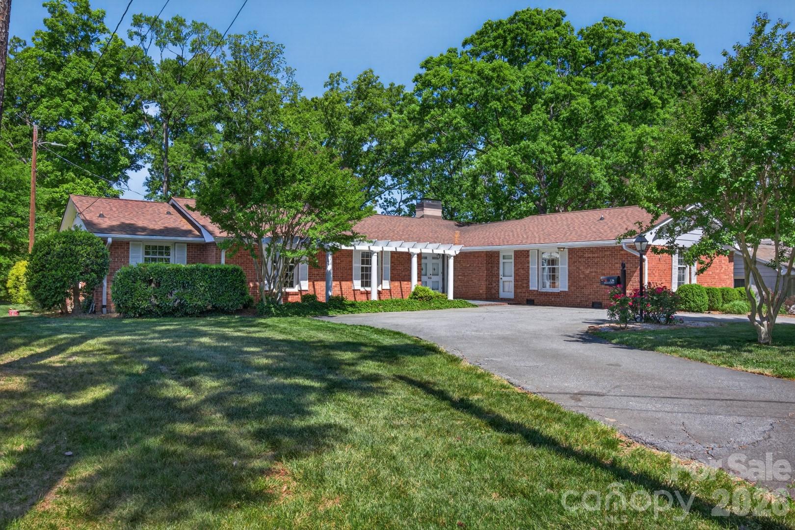 Check out this awesome opportunity in the Country Club of Salisbury neighborhood in a perfect location with some of the best neighbors you could imagine!  3,140 heated square feet, all brick, single level custom built home with 5 bedrooms & 3 full bathrooms.  Large rooms & plenty of closet space highlight this livable.  Living Room is 22' x 21' featuring a sided masonry fireplace & solid oak hard wood floors.  Primary bedroom has huge walk in close measuring 12' x 8'4" had has solid oak hardwood floor hidden under the carpet as do bedroom 4 & 5.  Family room is 18' x 13' features masonry fireplace with gas log & also has hardwood flooring under the carpet.  Huge Sun Room has floor to ceiling windows & slate tile flooring built in Jenn Air electric grill with down draft exhaust with pass through to kitchen.  Entry foyer features double entry doors with double storm doors & slate flooring.  Screen porch overlooking back yard.  Bedrooms 2 & 3 have separate entrance to the exterior & full bathroom which would allow them to easily be used as separate living quarters.  New Roof in 2019 with gutter guard leaf system, Heat Pumps are 2013 & 2005.  Replacement vinyl windows.  Kitchen updated in 2017 with granite countertops & stainless steel appliance including smooth surface slide in range/oven.  Exterior has nice lawn with in ground irrigation system.  Detached carport features attached brick storage uint with doubles doors on front and door at the rear.  Beautiful flat lots with nice landscaping, lush green grass, & nice shade trees.  Topped off by front patio / pergola & circular driveway this home has a lot to offer & lots of opportunity! All this located very close to the Country Club of Salisbury, with low cost membership offers; Donald Ross golf course,  driving range, putting green, short game practice facilities, golf pro shop,  lighted tennis & pickleball, tennis pro shop, swimming, grill room, patios, multi bars, gourmet dining, private dining rooms, as well as many social activities.    Schedule a showing today!!