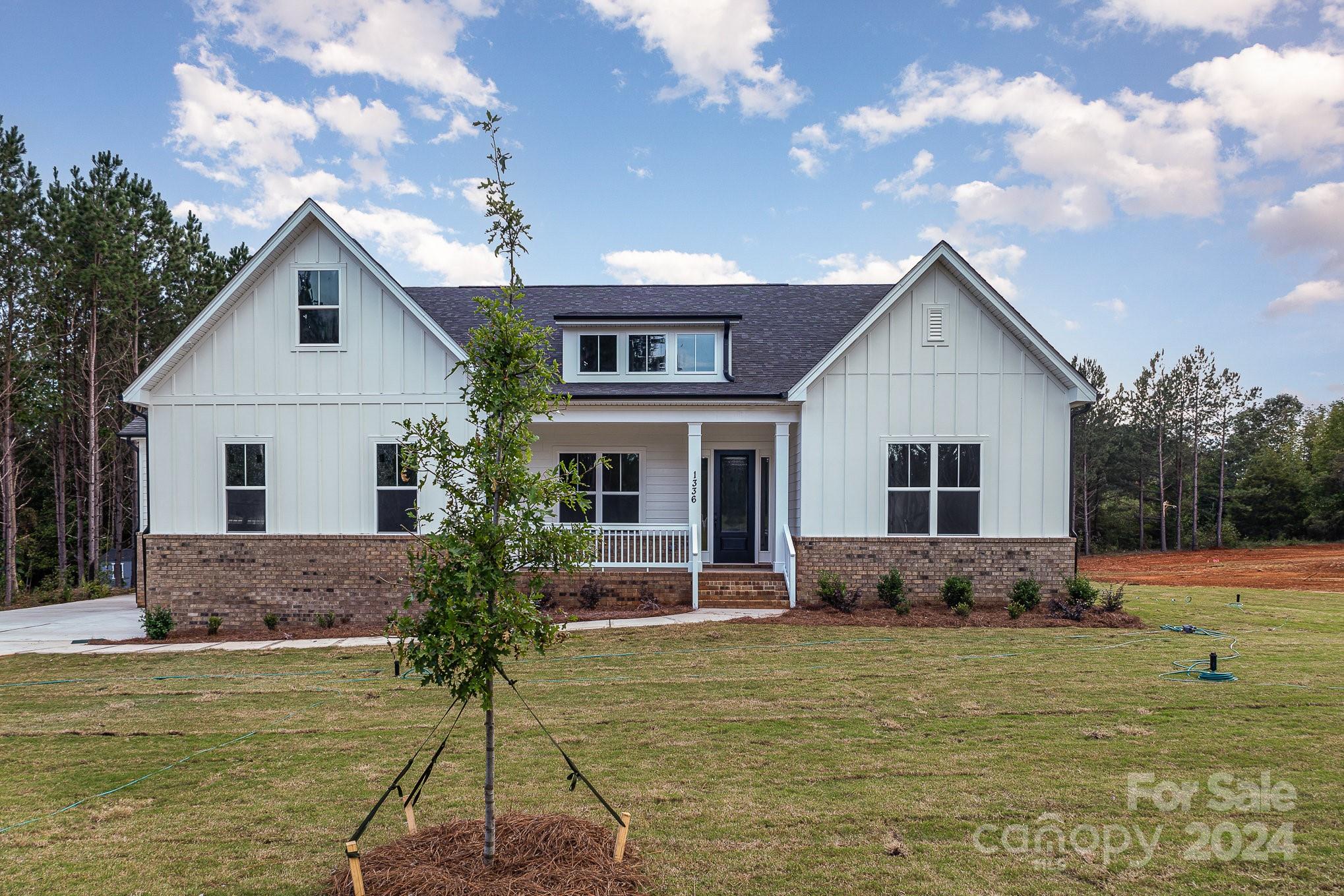 NEW CONSTRUCTION and MOVE-IN READY! Open concept plan features the Epicurean Kitchen w/quartz countertops, double wall ovens & large farmhouse island. Casual Dining & Family Room, featuring coffered ceiling & modern fireplace & lots of natural lighting, opens to covered deck. Impressive owner's suite with trey ceiling, quartz countertops, stand-alone tub, & walk-in shower. Hardwoods throughout 1st floor, except secondary bedrooms. Upstairs Retreat offers huge loft area for fun & entertainment, along with the 4th BR and 3rd full BA! 3-car garage provides room for outdoor toys & the 1+ acre homesite, in prestigious Clover schools, is perfect for outdoor living. Video is representative of a previously completed Columbia plan. Encapsulated and conditioned crawl space! Closing contributions available with preferred lender!