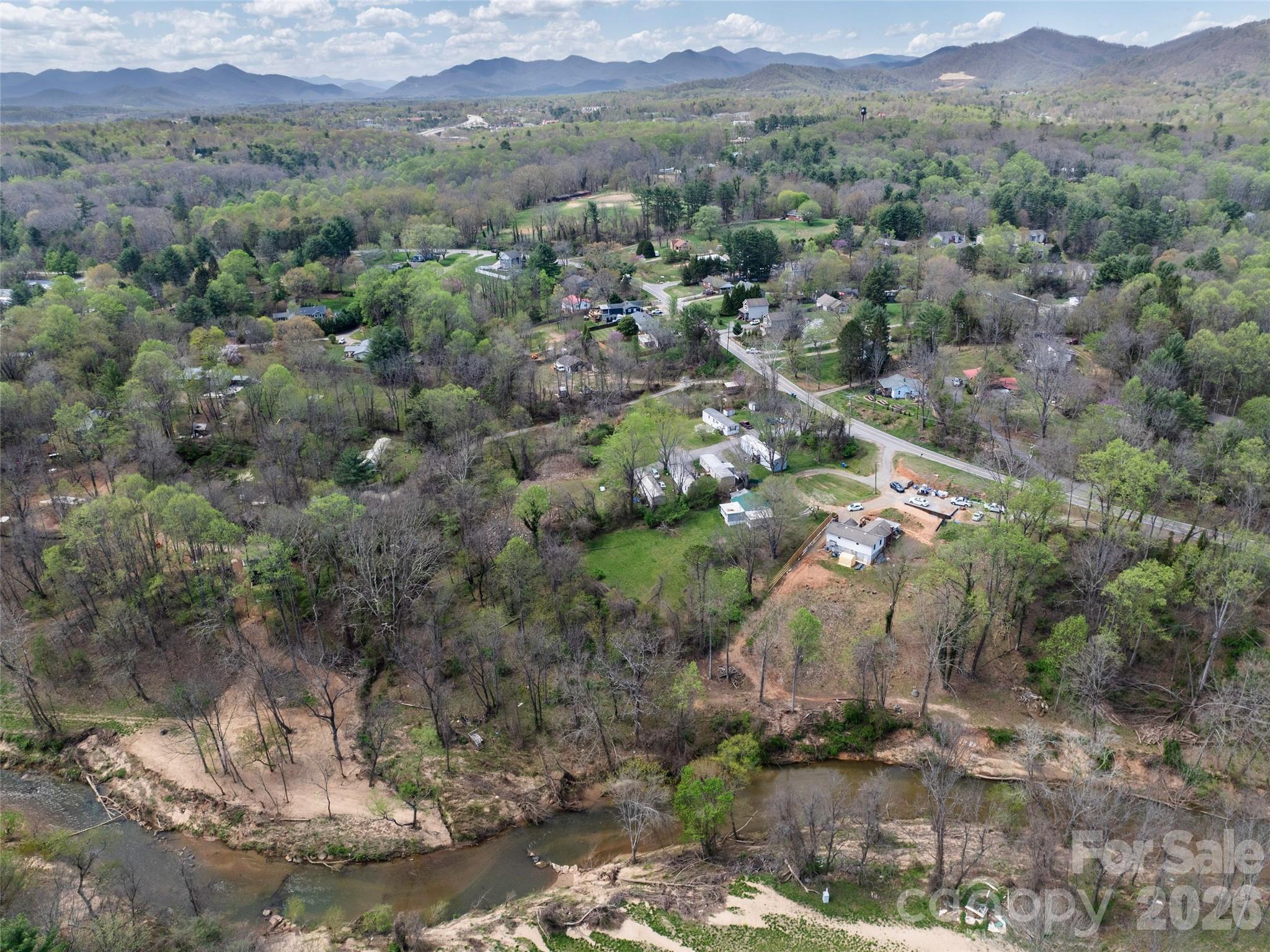 Fully entitled and shovel-ready 2.13± acre residential development site (zoned RM6) in West Asheville, approved for seven (7) homesites. Utilities are available along Sand Hill Road, and the property was not damaged by Hurricane Helene. Exceptional connectivity with convenient access to I-40, Patton Avenue, and Smokey Park Highway. Ideal for a builder seeking a near-term start in a high-demand submarket.