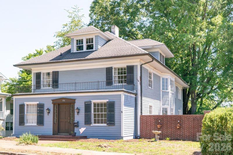 Step into timeless elegance at this distinguished 1917 historic home in the heart of Lenoir. Situated on a deep .65 acre lot, this stately residence blends classic architectural character with generous living space and a modern chef's kitchen showcasing a 6-burner convection oven w/ griddle and a coffee bar. Featuring 4 bedrooms upstairs, including 2 primary, and 2 full baths. The home displays beautiful original hardwood floors, original windows, multiple fireplaces, both gas and woodburning, built-ins, crown molding, wormy chestnut walls, marble flooring, spacious gathering areas and abundant lighting throughout. The thoughtfully designed layout includes a finished basement (662 feet does not meet ceiling height) with kitchenette offering flexible space for recreation, entertaining or a home office. The finished attic has a bathroom (never used) and extra living space (289 excluded due to ceiling height) with storage and cedar closets. Outside, the detached garage and expansive yard provide ample room for outdoor living, gardening or future possibilities with a firepit and fenced yard. Rich in charm and craftsmanship, this property captures the beauty of a bygone era and is being sold 'AS IS" due to age. City water/sewer. Electric is Duke, PNG, sump pump and built-in dehumidifier in basement.