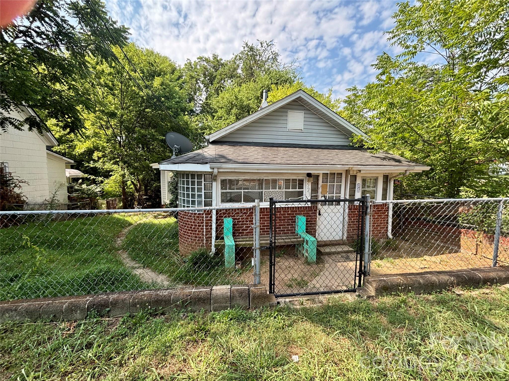 Opportunity awaits at 523 W. Oakwood Ave. This charming 2-bedroom, 1 bath home offers approximately 1,022 square feet of living space in the heart of Albemarle. Featuring a brick exterior, one-level living, public water and sewer, and a convenient location close to shopping, dining, schools, and downtown, this property is full of penitential. Whether you're an investor, or someone looking for a home to make your own, this is a great opportunity to add your personal touch and build equity. Property is being SOLD AS IS. Seller will make no repairs
