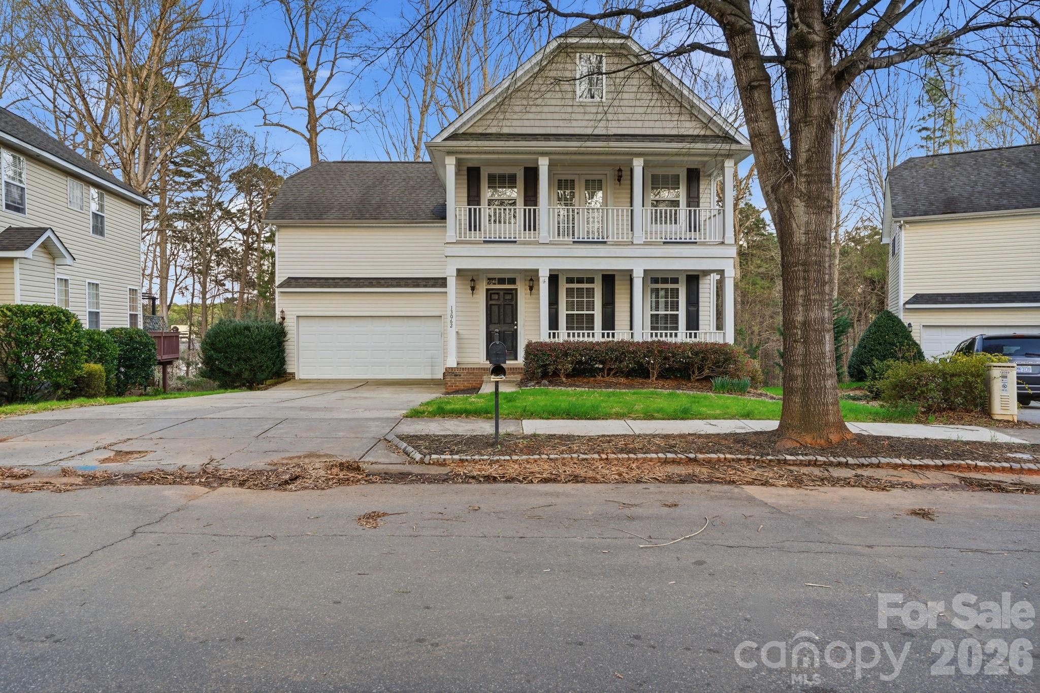 Charming two-story home featuring 4 bedrooms and 2.5 bathrooms with a functional and inviting layout. The living room offers a cozy fireplace, creating a warm focal point for relaxing or entertaining. The dining room showcases elegant crown molding, adding a refined touch to gatherings and everyday meals. The kitchen overlooks the main living space, enhancing the open feel of the home. Enjoy outdoor living with a wood deck in the backyard, perfect for grilling or unwinding, while the front balcony provides a great spot to enjoy morning coffee or evening air. A wonderful opportunity with comfortable living spaces inside and out.