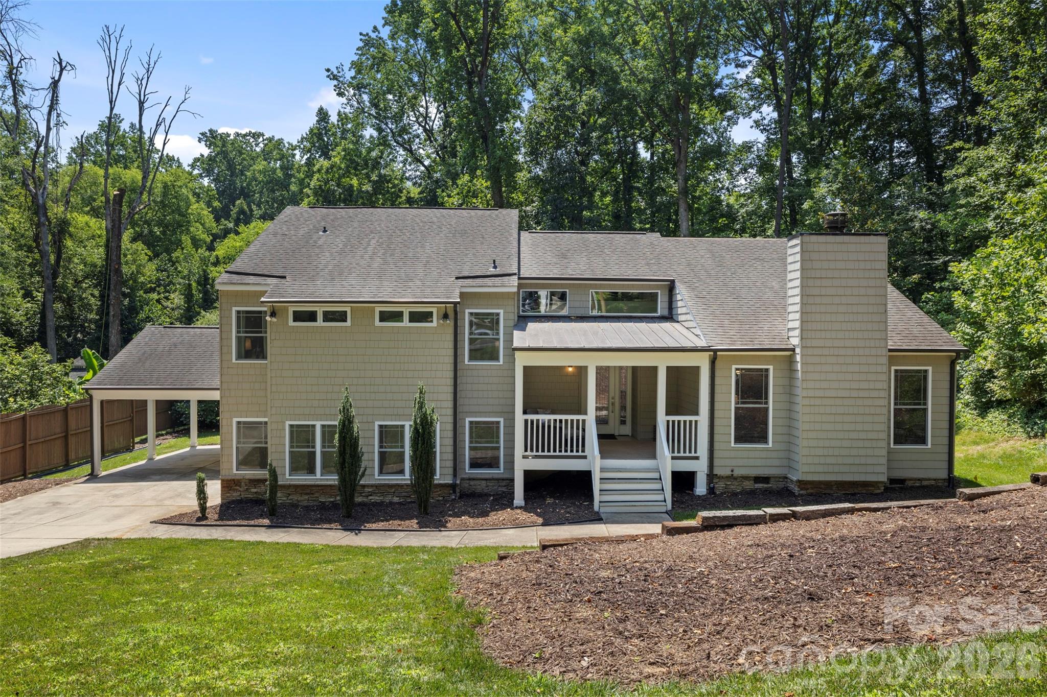 Some homes simply offer more—and this is one of them.

Nestled on a private, wooded .65-acre lot in the established Singing Springs neighborhood, this distinctive contemporary tri-level home offers over 3,300 square feet designed for the way people live today. Whether you need room to spread out, work from home, entertain, or accommodate multi-generational living, the flexible layout provides endless possibilities.

At the heart of the home, the spacious kitchen features generous prep space, a gas range, prep sink, beverage center with a wine fridge, and opens to inviting living and gathering spaces filled with natural light.

Thoughtful recent updates mean you can move in with confidence, including new main-level flooring, a brand-new HVAC system, new crawl space insulation, and a new vapor barrier. The home also features two laundry hookups, offering added convenience and flexibility.

Step outside and discover even more potential. The detached shed has been upgraded with electricity, making it the perfect workshop, home gym, creative studio, or hobby space. Above the shed, an unfinished bonus room is ready to become a home office, guest suite, studio, or additional storage—the choice is yours.

Surrounded by mature trees and located just minutes from South Charlotte's shopping, dining, parks, and everyday conveniences, this is a home that offers the space, character, and versatility that's increasingly hard to find.

Come experience all the possibilities 6219 Fair Valley Drive has to offer.
