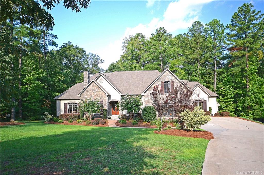 Just an incredible custom built ranch home.  Impressive upgrades include first floor panel office w/ built in bookcases, exotic hardwoods, tray ceilings and four fireplaces.  Gourmet kitchen features center island, granite counters, gas range/stove and stainless appliances.  Basement provides recreation room with wet bar and media room. Large bonus room over the three car garage. Enjoy evening from spacious screened porch overlooking private back yard. Just minutes for dining/shopping. Must see!