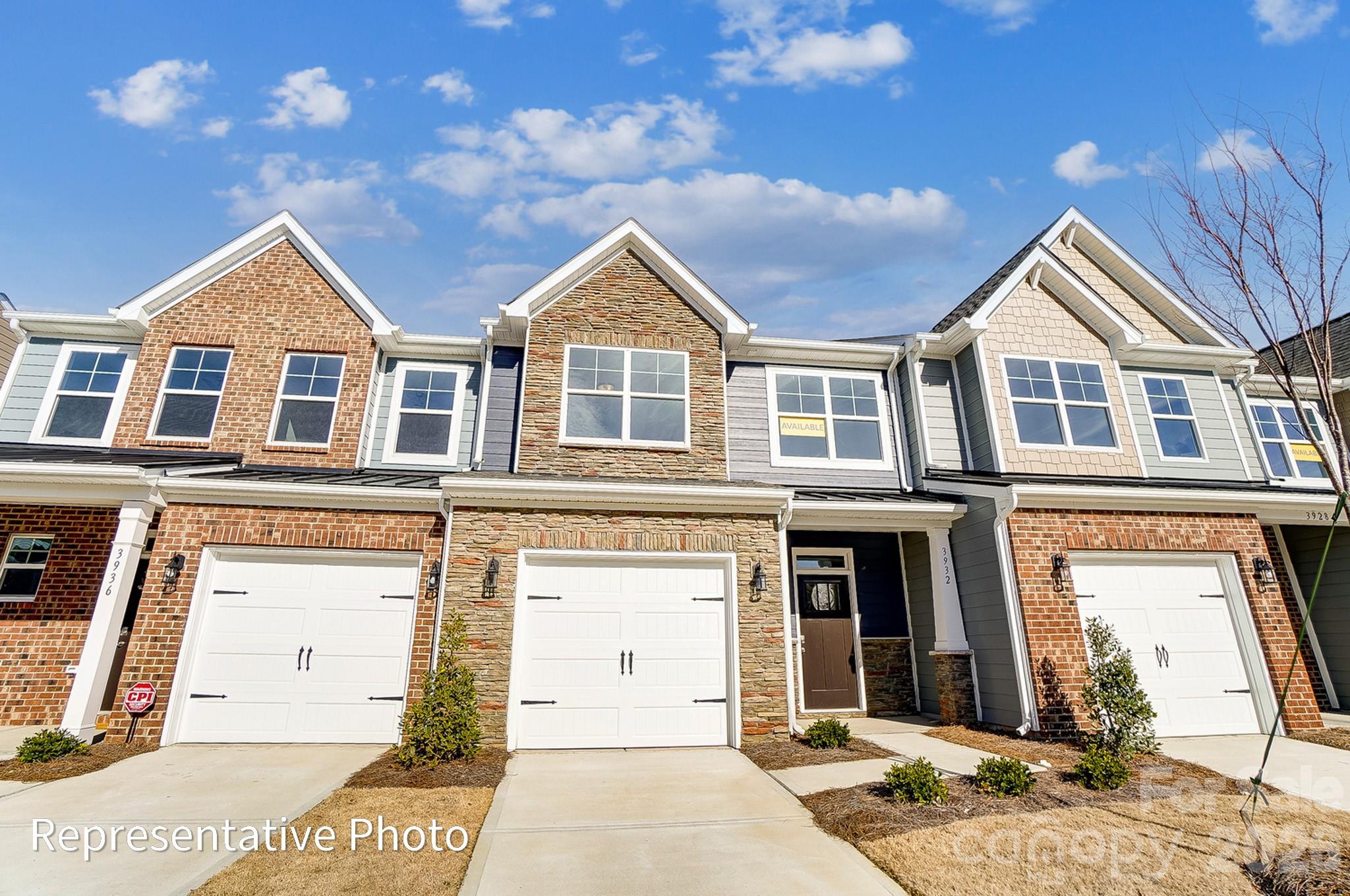 New townhomes in Harrisburg! This Ashland plan has 3 bedrooms, 2.5 baths, and more than 1,800 square feet of living space. The beautiful kitchen has Shaker-style, white cabinets, quartz counters, tile backsplash, and stainless appliances, including a gas range and microwave. The kitchen opens into the dining area and family room, which opens to the patio. Stairs with metal balusters lead to the upper floor that has a loft, laundry room, two secondary bedrooms, a hall bath with tub/shower combo, and the spacious primary suite with a large walk-in closet. The primary bath has a tiled shower with a bench seat, dual-sink vanity, and a linen closet. All bathrooms feature white cabinetry and white quartz counters. Additional extras include a foyer with tray ceiling and Enhanced Vinyl Plank flooring throughout the main level. Community amenities feature a dog park, playground, paved walking trail, outdoor pool & cabana.