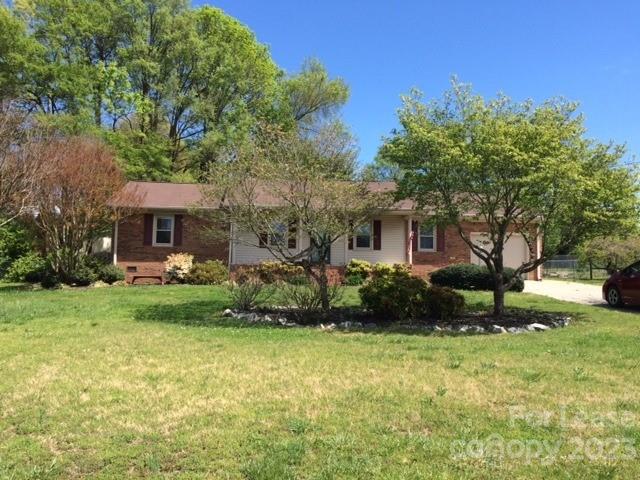Beautiful home with many upgrades. Kitchen has quartz countertops, updated bathrooms. Fenced backyard, oversized patio and wired out building. Showings scheduled for approved applicants only.
