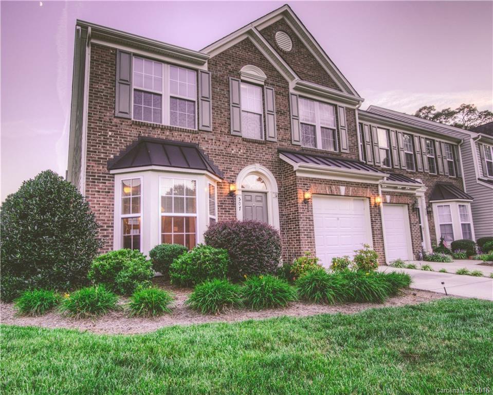 Immaculate Sunset Point Brick End-Unit Townhome less than a mile from Lake Wylie! This well-designed home is nearly 1900 square feet & lives even larger. Centrally located kitchen features rich Maple cabinetry & breakfast bar opening to vaulted great room. Gleaming hardwoods in the entry, breakfast nook, & kitchen. Private owner’s suite on the main level highlighted by floor to ceiling windows & designer tray ceiling. Upstairs you’ll find a large loft, two oversized bedrooms & a full bath.