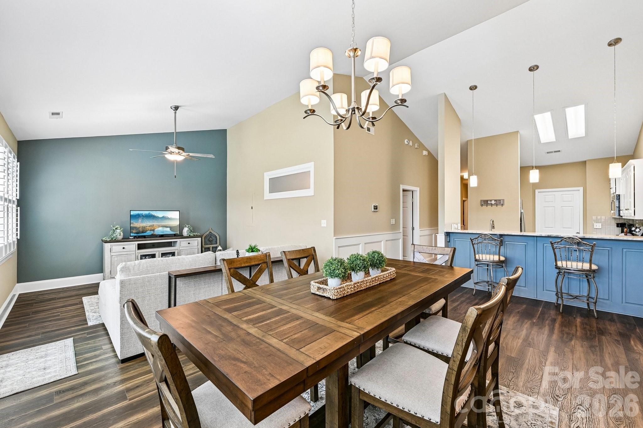 You may be ready to downsize—but you don’t have to downgrade.

This beautifully updated townhome in The Terraces offers one of the community’s most desirable floor plans, enhanced by thoughtful redesign and upgrades that deliver a true luxury feel at an exceptional price point. With 1,383 square feet, this is a larger unit that lives comfortably and efficiently.

The interior has been fully refreshed with new flooring and carpet, smooth ceilings (no popcorn), upgraded lighting, and added architectural detail including chair rail and crown molding, along with plantation shutters. The living space has been opened up by removing two bump-outs, creating a more modern feel with an accent wall and a more functional layout.

The kitchen has been improved with painted cabinetry, soft-close drawers, and all new appliances. The pantry has been upgraded with custom shelving, while the original laundry/pantry area was redesigned to create a true dedicated laundry room with a pocket door—no longer just a hallway setup.

The primary suite features a walk-in closet with custom shelving and an upgraded glass shower door in the primary bath. Bathrooms include granite countertops, and the layout has been thoughtfully reconfigured to create a true three-bedroom design by adding a closet with a barn door. Additional enhancements include built-in closets throughout.

Major systems include a newer HVAC system and a brand new water heater, plus an added hose bib and installed security system.

HOA includes water and sewer, exterior maintenance (gutters, exterior paint, landscaping, and amenities), and trash service—making for easy, low-maintenance living.

Located in a welcoming 55+ community designed for comfort and ease, where neighbors look out for one another and life moves at a more enjoyable pace. Conveniently close to Lake Norman, shopping, dining, and medical care, with quiet streets and green spaces that make it easy to relax, connect, and enjoy your surroundings.

Move-in ready, upgraded where it matters, and paired with a lifestyle that delivers—this is downsizing done right without compromise.