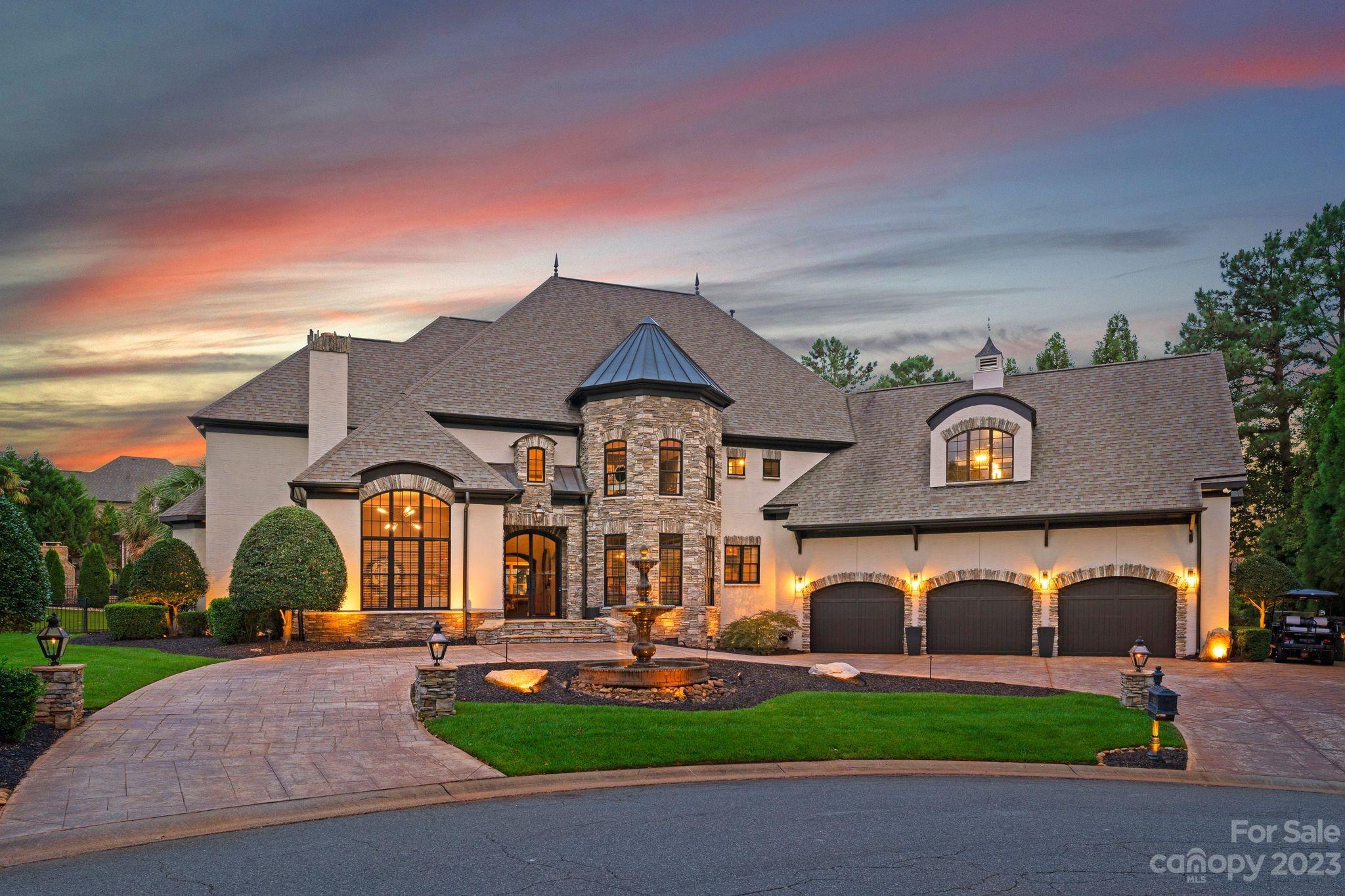 Experience exquisite luxury in this 3 story masterpiece nestled within a serene cul-de-sac in The Peninsula community. The main level is a symphony of elegance & functionality, featuring office w/fireplace, 2 story great room & kitchen that seamlessly flows into family room w/its own fireplace, well-appointed breakfast area & laundry room. On this level, the primary suite is a sanctuary of comfort, complete w/sumptuous ensuite bath. As you ascend to the upper level, you'll find 4 add’l bdrms, each w/its own full bath, ensuring absolute comfort & privacy, an exercise room & a bonus room. Third level reveals a true treasure w/a dedicated movie theater room, where cinematic experiences become a part of daily life. Step outdoors to discover an entertainer's dream w/an outdoor oasis featuring a putting green, a sparkling pool, firepit & large, fenced backyard. This home epitomizes the perfect balance between sophistication & entertainment, offering a lifestyle of unparalleled luxury!