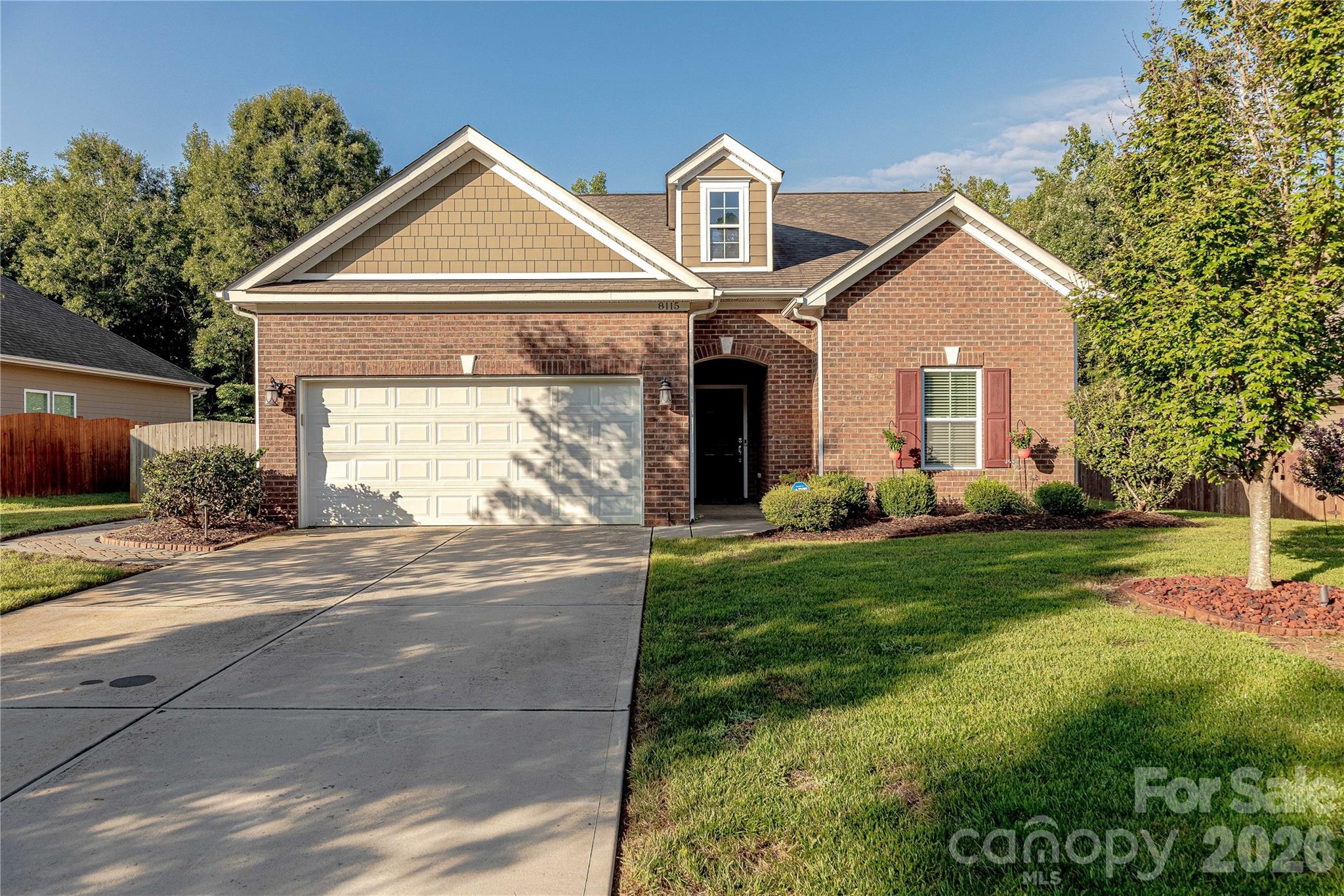 Beautiful 1.5 story home situated on a dead end street in desirable Ravencroft! New luxury vinyl flooring throughout main floor unites the open floor plan. The kitchen features staggered cabinetry, tile backsplash, granite countertops and vented gas range. Fireplace feature in great room along with custom curtain valances. Fully finished sunroom adds a wonderful flex space. Primary bedroom with vaulted primary bedroom includes an ensuite bathroom. The second floor has an open loft along with a full bathroom and spacious 4th bedroom. As if the interior wasn't enough, the exterior is what really sets this home apart. The backyard is a true oasis with a covered paver patio that extend into a walkway to the side of the home, hot tub and custom Bocce ball court. The fully fenced yard backing up to the woods provides the perfect place to relax or play. Other features include full front and back irrigation, landscape lighting , epoxy flooring and storage system in the garage.