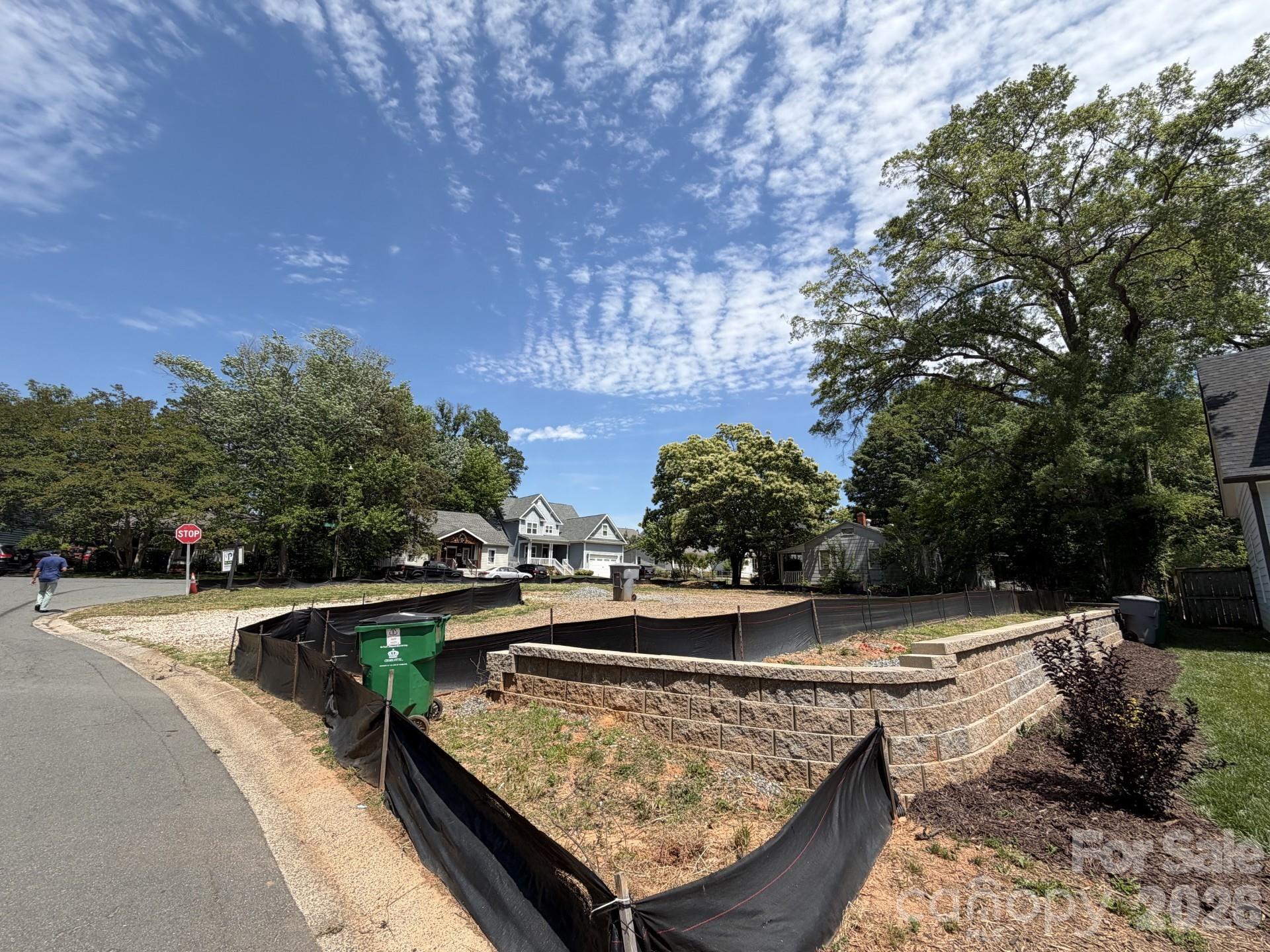 Exceptional opportunity to build your dream home on a prime corner lot in the desirable Sedgefield neighborhood. The site is build-ready, featuring approximately $75,000 in completed grading, including a professionally installed retaining wall—significantly reducing upfront construction costs. A rare offering with major site preparation already completed in an established area.