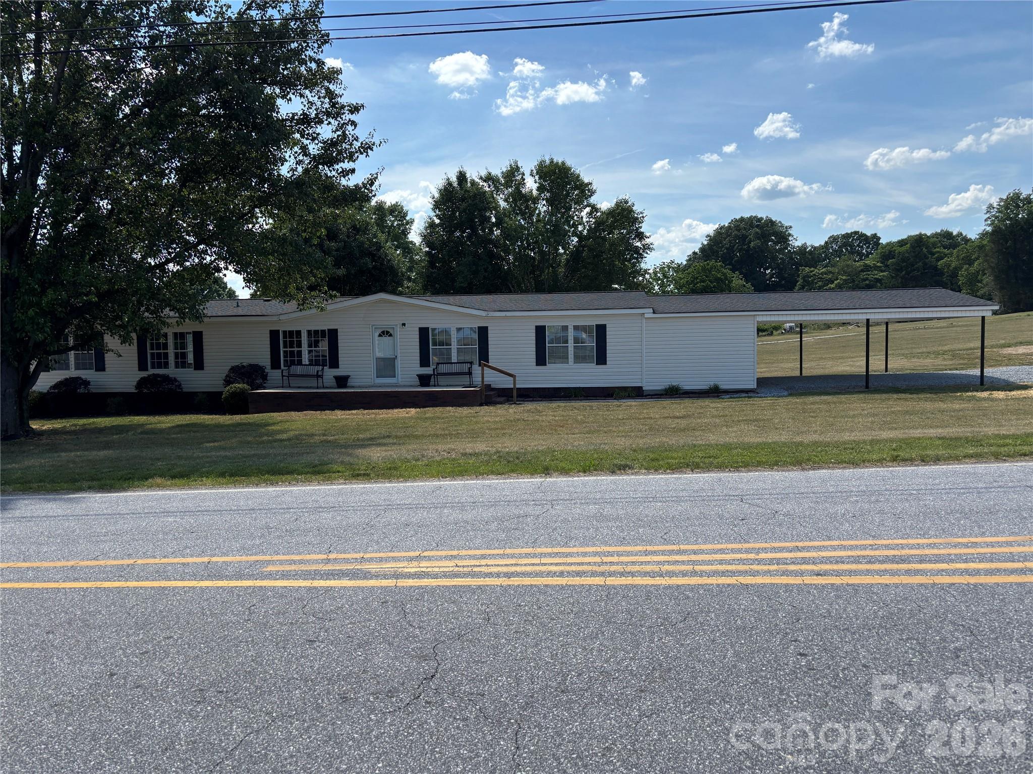 Check out this stunning home with five bedrooms, three bathrooms, and a level lot located in the Town of Taylorsville. This beautiful home has had many updates which include a new roof in 2018, a new HVAC heat pump system in 2024, recently updated bathrooms, new vinyl plank flooring throughout, and a recently fully remodeled kitchen with new countertops, new cabinets, and new kitchen equipment. This home features sheet rock walls and an open floor plan with a large family room for entertaining all your quests. A two-car oversized carport with a large storage room. A rear porch and a rear deck for all your outdoor entertaining. Not another one on the market and this home will not last long.