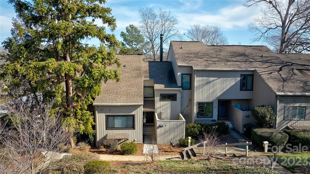 This is the 1 you have been waiting for! Waterfront/waterview remodeled and updated townhome in desirable gated community of River Hills on Lake Wylie.  4 bedrooms and 3 full baths! Bedroom on the first floor! Oversized master with its own sitting room/flex space /huge walk in closet and a deck! The downstairs offers walk out and own entrance with a covered additional deck/patio.  Lots of outdoor living and easy down the hill lake access for launching your kayak  Would be optimal for multi generational living.  Downstairs offers 2 bedrooms , another full bath and great room.  Neutral colors throughout and recently painted and updated.  Soaring fireplace in living room and open to loft for that open air feel.  All this and in the award winning Clover School District.  The community offers miles of walking trails, 18 hole golf course and country club, waterfront park with sandy beach, gardens, dog park and a marina.  Easy living and can lock up and go with no worries.  Welcome home!