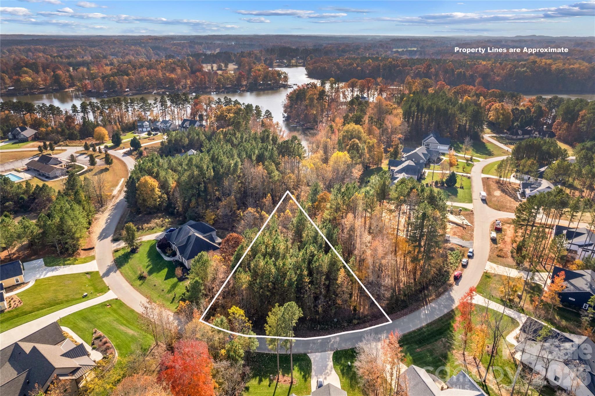 Discover the perfect canvas for your dream home on this stunning .52-acre homesite in the prestigious Sunset Pointe community. Nestled along the shores of High Rock Lake—North Carolina’s second-largest lake—this exclusive gated neighborhood offers the ultimate blend of serenity, recreation, and refined living.  Enjoy exceptional community amenities including a clubhouse, boat launch, outdoor pool, playground, and sport courts, all designed to complement a vibrant lake lifestyle. Conveniently situated near interstate, shopping, and dining, Sunset Pointe offers both tranquility and accessibility.  The lot will require a private well and connection to the community septic system.  Don’t miss this opportunity to build your forever home in one of the area’s most sought-after communities. Schedule your private showing today and experience the beauty of Sunset Pointe for yourself!