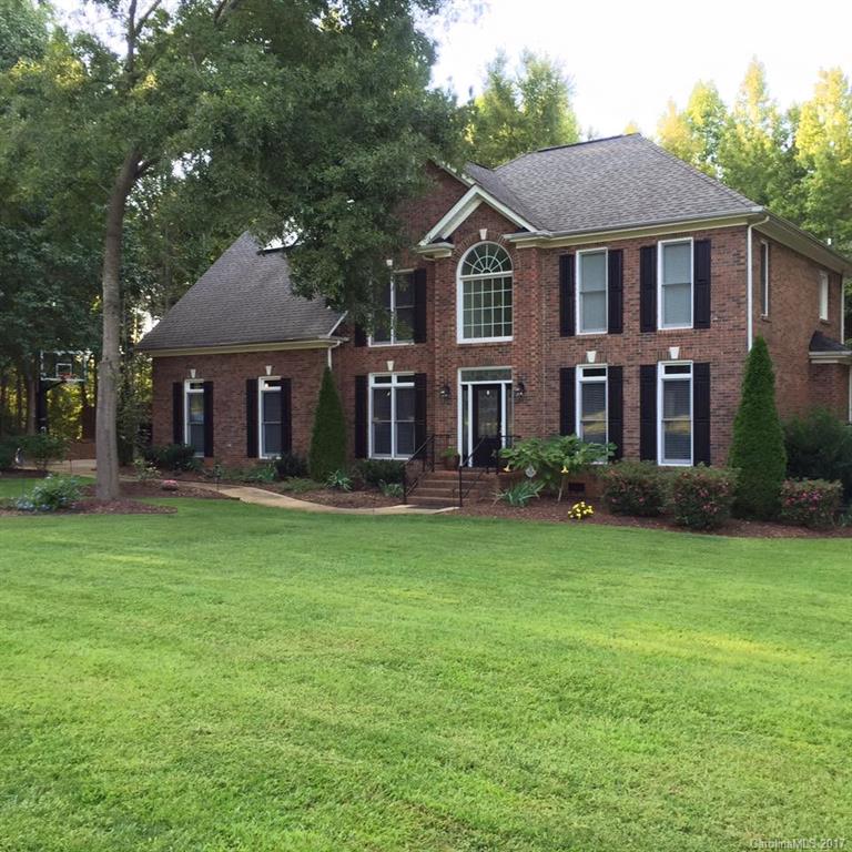 Prepare to be impressed with this custom, full brick, 4 bedroom 2.5 bath home with a bonus room.Nestled on 1.72 acres this home has it all and shows like a model! Updated kitchen with 42" cabinets, granite,glass backsplash and ss appliances. Private master suite with separate tub/shower.Tons of moldings and hardwoods. Relax in your fenced backyard complete with pool, hot tub and covered porch with shower. Whole house generator.Low York county taxes with award winning Clover schools! A MUST SHOW!