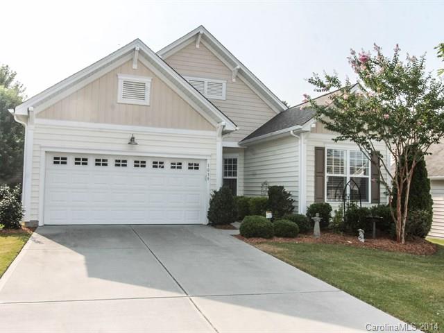 Impressive 1-story home with tons of windows! Beautiful Master Bedroom with bay window, plantation shutters, tray ceiling, walk-in closet, luxury bath. Living area has teak hardwood flooring, gas fireplace, custom built media niche, plantation shutters. Open/spacious kitchen with granite, breakfast nook, maple cabinets and  window seat. Sun room with built-ins & energy efficient solar shades. Lawn maintenance included in the HOA. Overhead storage in garage. Fridge and kit. island negotiable.