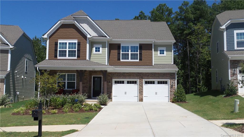 Practically Brand new in highly sought after Farms community!  5 bedroom, 4.5 bathroom with full guest suite on the main.  Three full bathrooms on second floor and full laundry room. Walk in closets in each bedroom. Updated with Blinds, ceiling fans in bedrooms, and professionally painted. Fenced Yard backed up to trees, one of the largest lots! Gorgeous outdoor covered patio with electric. Energy star rated. Better than New Construction!!