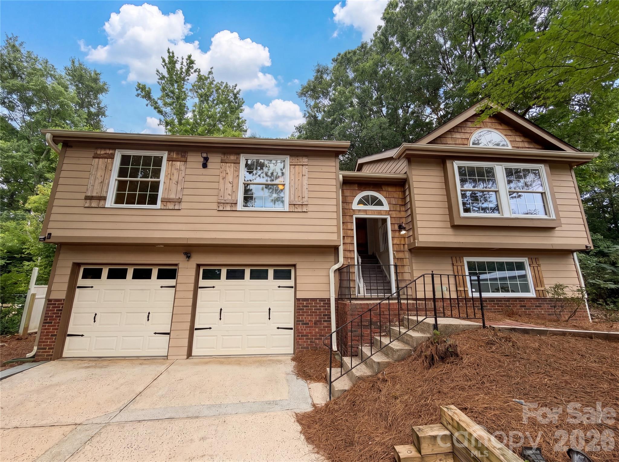 Welcome to this 3-bedroom split-level home in Charlotte, NC, offering space, flexibility, and endless potential in a location that's close to everything! Conveniently situated near shopping, dining, parks, major highways, and everyday amenities, you'll love the accessibility this home provides.

Inside, the functional split-level floorplan offers comfortable living spaces with additional unfinished rooms on the lower level that present exciting opportunities for future expansion. Whether you're dreaming of a home office, recreation room, guest suite, workout space, or extra storage, this home gives you the flexibility to create a space that fits your lifestyle.

Step outside to the screened back porch, the perfect place to relax with your morning coffee or unwind in the evening while overlooking the spacious backyard. While the yard could benefit from some landscaping, it offers plenty of room to create your own outdoor retreat.

Whether you're looking for a home to move into and update over time or an opportunity to add value, this Charlotte property is full of possibilities. Don't miss your chance to make it your own!