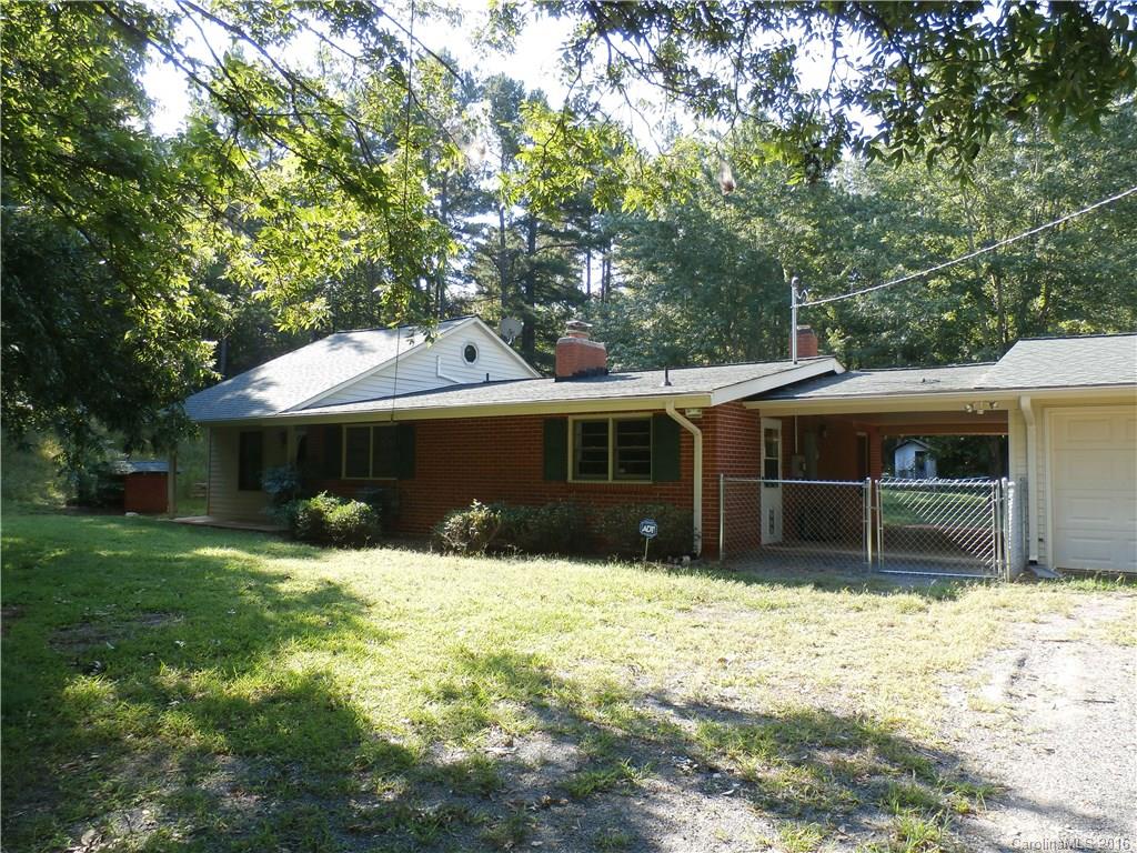 Instant equity! Priced $10K below appraised value! If you are looking for a great home w/lots of land and wooded privacy, this is the home for you! Great ranch home on private lot has two car attached garage, shed and  separate storage building too! Fenced yard around home and hot tub too! Covered breezeway! Oversized great room w/fireplace. New carpeting downstairs. Bedroom/bonus room on  second floor! Don't miss this great home, make your appt. today!