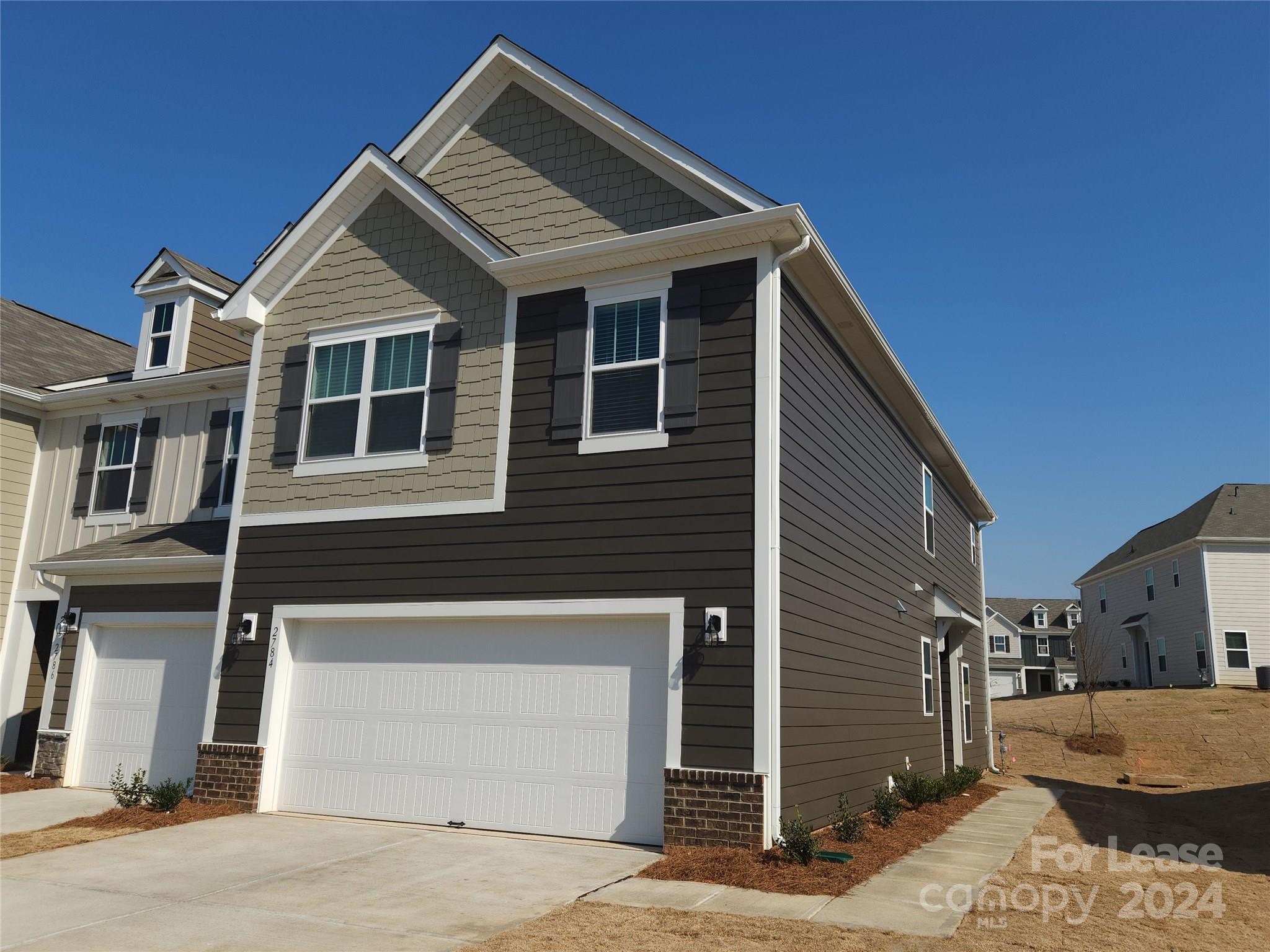 This charming 3 bedroom, 2.5 bathroom townhome is nestled in the desirable Piper Landing community of Concord, NC. Boasting a 2-car garage, an open concept living area with LVT flooring, and carpet in the bedrooms, this home offers a blend of comfort and style. The kitchen features a breakfast area, stainless steel appliances, granite counters, and a kitchen island, making it ideal for entertaining guests or preparing family meals. The family room seamlessly connects to a private back patio through sliding doors, providing a perfect spot for relaxation and outdoor enjoyment. Upstairs, a loft, laundry closet - washer/dryer included, and spacious bedrooms provide ample space for living and storage. The owner's suite boasts dual sinks, a linen closet, a large shower, and a walk-in closet, ensuring a luxurious retreat. With its convenient location, modern amenities, and inviting atmosphere, this townhome is the perfect place to call home.