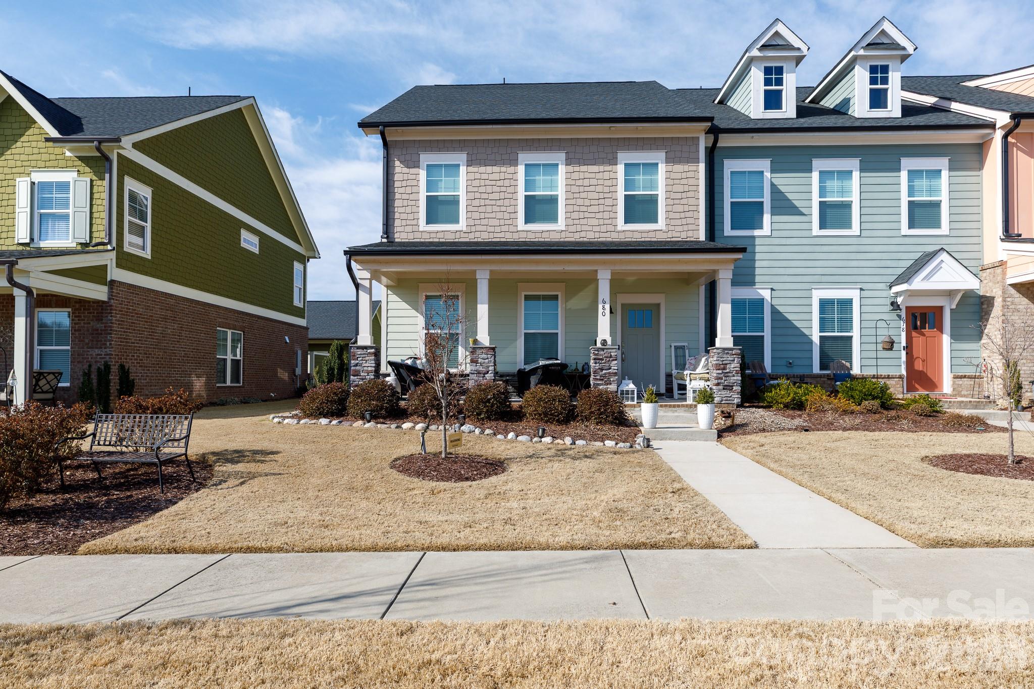 Beautiful end unit that has been wonderfully maintained and is truly move in ready! This home opens into a gracious and inviting living room that seamlessly flows into your chef's kitchen and outside where you will find your back patio space as well as your detached 2 car garage. In the upper level you will find the primary bedroom equipped with a large walk in closet and full bath. Additionally, the second level is home to additional bedrooms, another full bath, and dedicated laundry space. Riverwalk's River District offers shopping, restaurants, outdoor trails, and much more right out your front door!