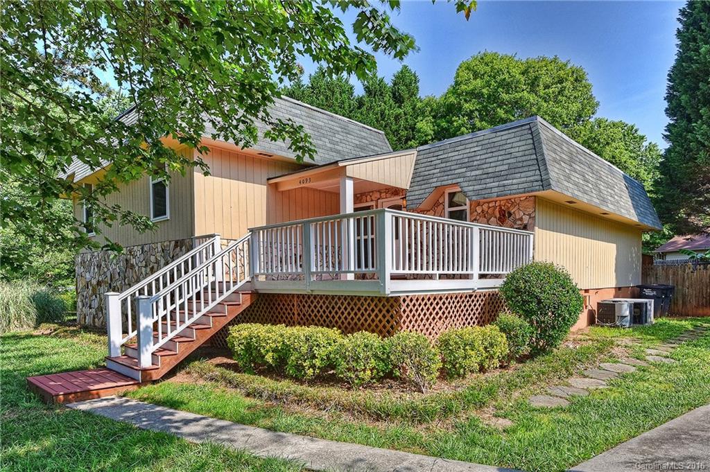 Updated Polynesian style home in sought after Tega Cay!  Updated kitchen with high end cabinetry, soft close doors, granite, new stainless steel appliances, new flooring, smooth ceilings, new plush carpet, updated baths!  All this with a pool!  Hard to find in Tega Cay.  Across from the playground and close to all the amenities that Tega Cay offers, Lake, walking trails, golf course, tennis courts. Top rated schools!