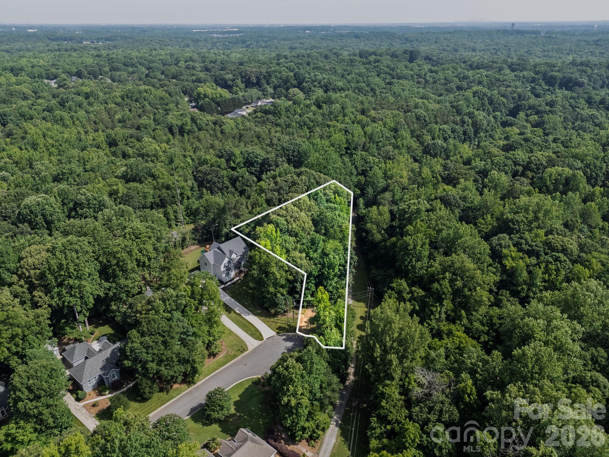 Have you ever dreamed of living at the park? This cul-de-sac 1.08-Acre Lot offers a rare opportunity to build your dream home surrounded by the natural beauty of the Anne Springs Close Greenway. Enjoy the perfect balance of privacy and convenience to shopping, recreation and TOP-RATED Fort Mill schools. ALL utilities available at the street. Survey completed, just bring your builder and create the lifestyle you have always imaged in one of Fort Mill's most desireable settings. The neighborhood of Whiteville Park is blocks from charming downtown Fort Mill with direct access to all that Anne Springs Close Greenway has to offer.