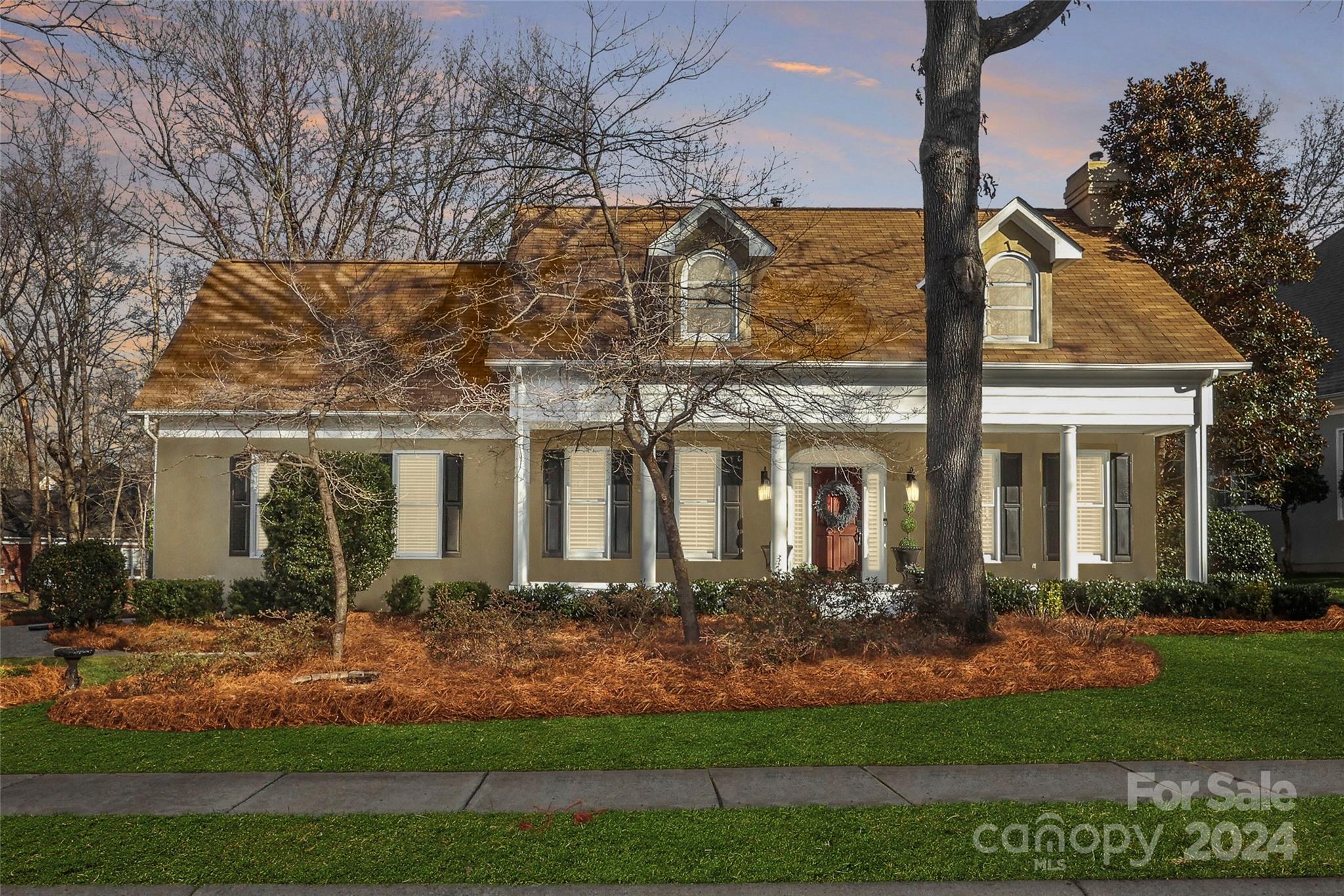 Come and see this beautiful home located on a cul de sac in Cotswold! The large front porch and nicely landscaped front yard highlight this home's curb appeal.  The first floor features a dining room, a living room that is open to the breakfast area and the kitchen, a powder room and laundry room.  The spacious renovated kitchen, with tons of natural light pouring in from the huge picture window, boasts new cabinets, quartz countertops and stainless steel appliances. Upstairs features the primary suite, two secondary bedrooms (one with office nook) and a hall bathroom. The primary suite is a true retreat featuring a large shower with frameless door, dual sinks with quartz countertops and an incredible walk-in closet. The attached garage features epoxy flooring, built in cabinets and lots of storage. The backyard is carefully landscaped around a spacious hardscaped patio and the lot abuts the neighborhood common area, making this beautiful retreat feel even more private. Welcome home.