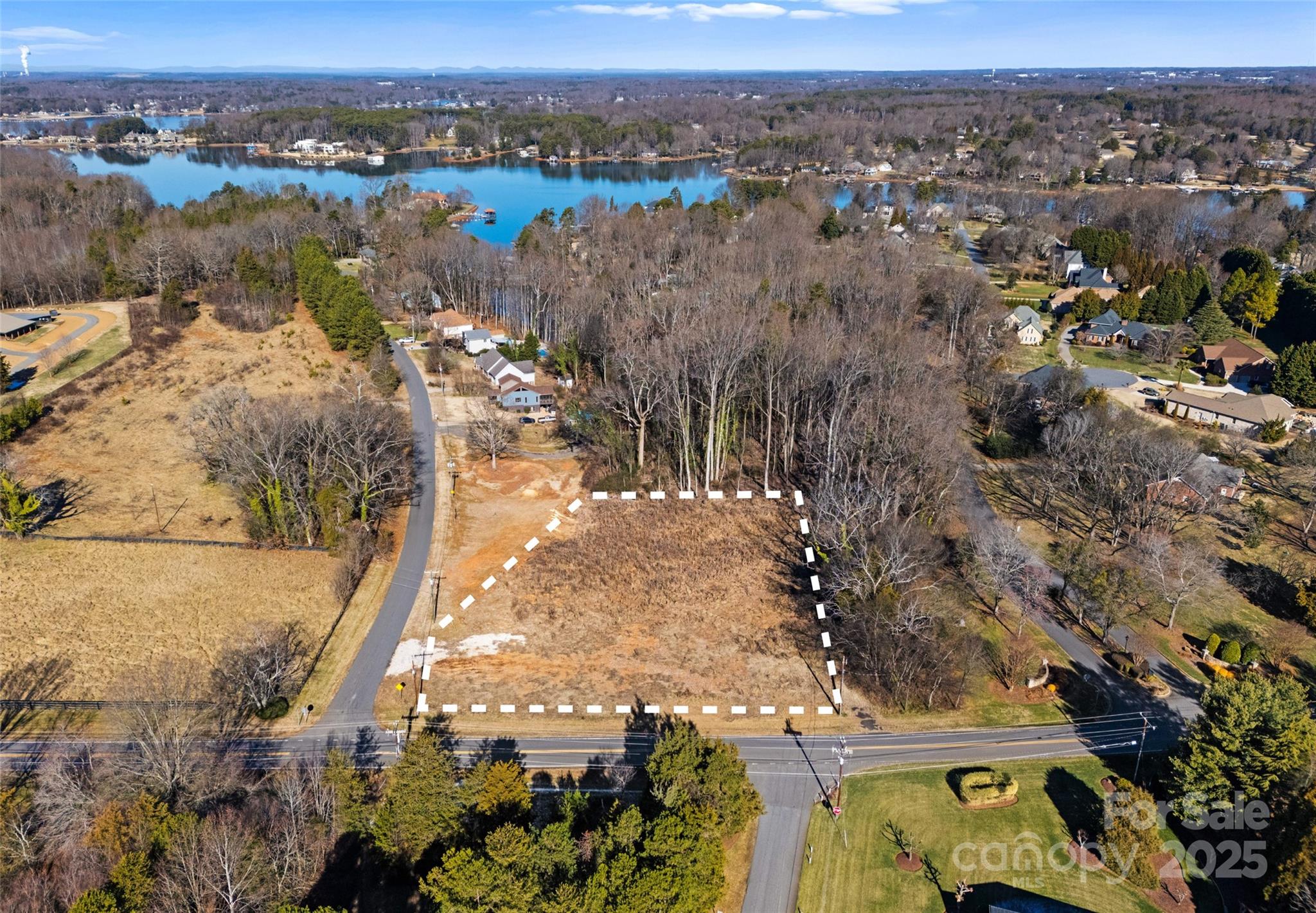 Discover the potential of this cleared and ready-to-build 1.46-acre lot at 522 Langtree Road in Mooresville, NC. Whether you’re planning to construct your dream home or seeking a prime investment opportunity, this property offers a clean slate for your vision. Ideally located just minutes from the vibrant Langtree Village development and within walking distance of Lake Norman, this lot provides the perfect blend of convenience and lifestyle. With easy access to I-77, major interstates, top-rated schools, and the nearby Lowe’s Corporate Campus, the possibilities are endless for custom homes or development projects in this thriving area. Seize this rare opportunity to own land in one of Mooresville’s most desirable locations.