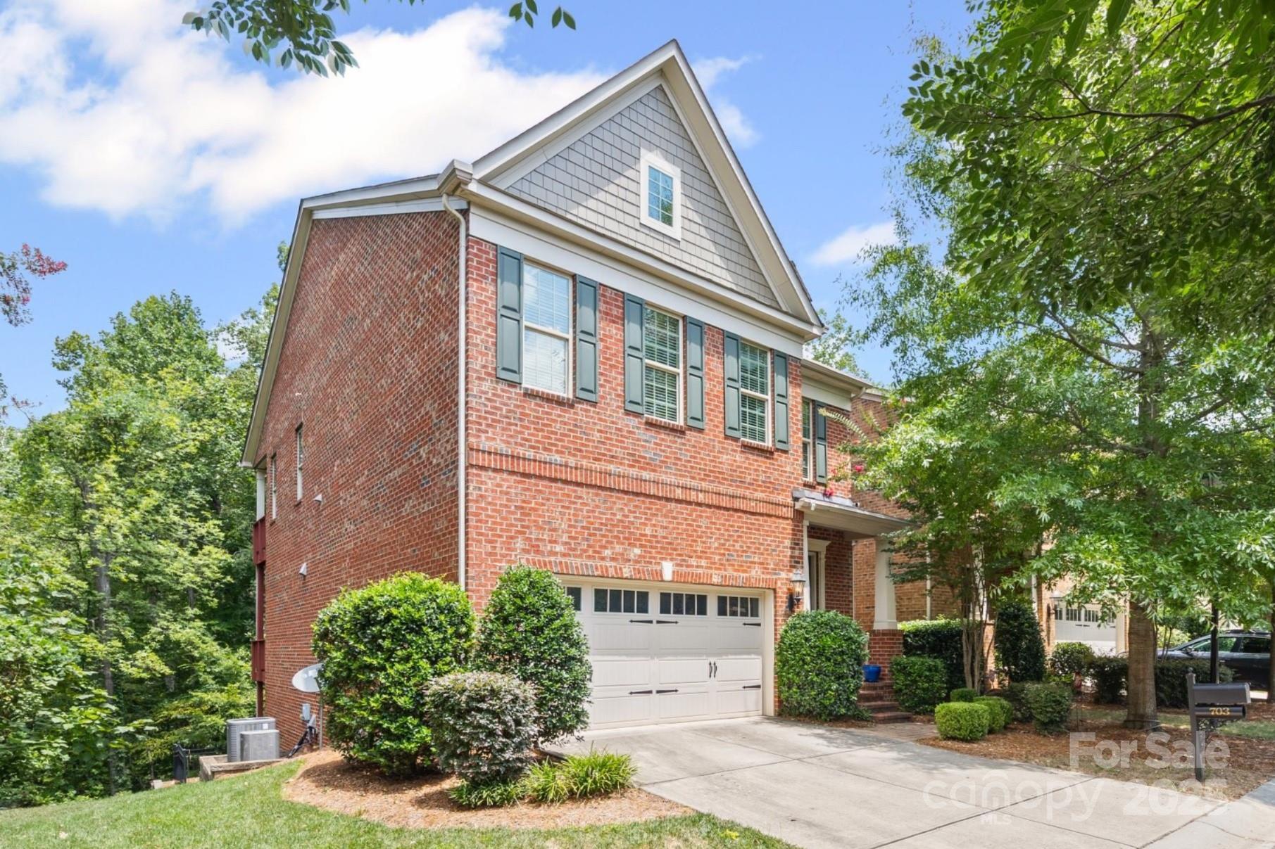 Welcome to 703 English Tudor Lane, an exceptional blend of timeless charm and modern luxury nestled in one of Charlotte’s most desirable neighborhoods. This beautifully maintained 4 bedroom, 4.5 bath home showcases classic Tudor architecture with stunning brick and stone detailing, arched doorways, and meticulous landscaping that enhances its curb appeal. 
Step inside to find an inviting open floor plan filled with natural light, featuring gleaming hardwood floors, designer lighting, and custom millwork throughout. The gourmet kitchen boasts high-end stainless-steel appliances, granite countertops, a large island, and an adjoining breakfast nook perfect for casual dining.
A spacious living area with a cozy gas fireplace leads seamlessly to a charming outdoor patio — ideal for entertaining or relaxing in a private, tree-lined backyard. The luxurious primary suite includes a spa-inspired bathroom with dual vanities, a soaking tub, and a walk-in closet. Additional highlights include a formal dining room, a versatile home office, and an attached two-car garage.
Located just minutes from SouthPark, Cotswold, and Uptown, this home offers the perfect balance of peaceful living and city convenience.
Don’t miss your chance to own a piece of classic Charlotte elegance — schedule your private tour today!