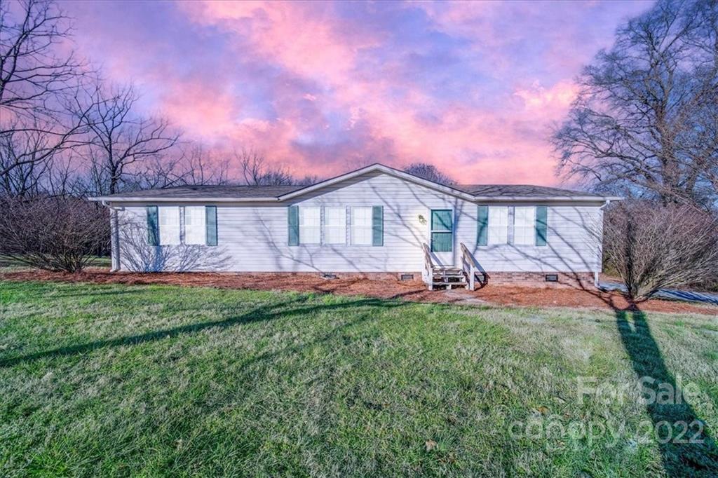 **Back on the market at no fault of the seller. Buyers financing fell through** 
This 3 bed 2 bath home is nestled on just under 2 acres right in the heart of Piedmont. Home is a split bedroom floor plan and has laminate hardwoods throughout.  With updated lighting and fresh paint this immaculately maintained home is move in ready. Outside you will find a large backyard perfect for your garden spot and a wired shed that is large enough for storage and would be perfect for someone with a hobby.