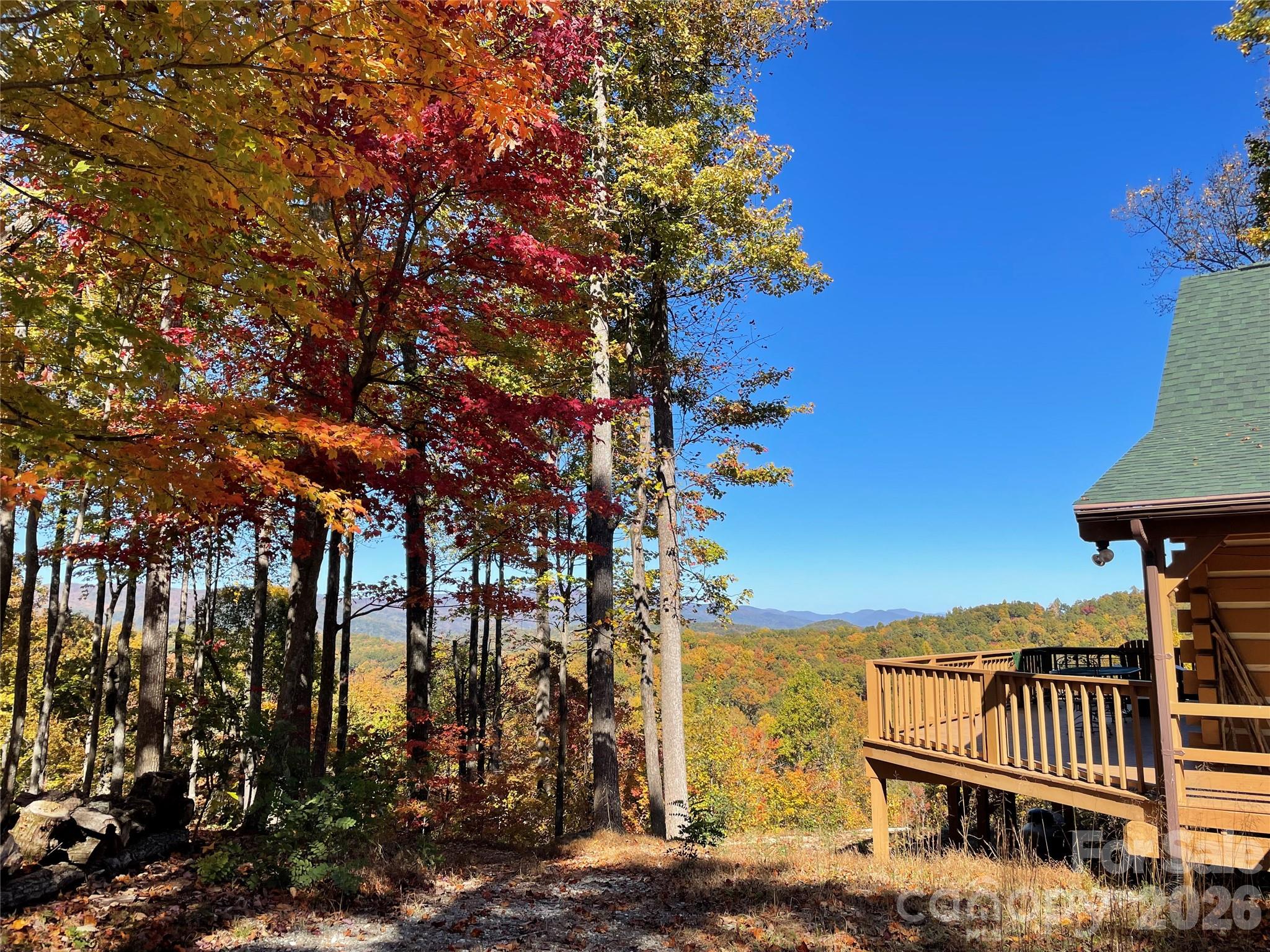 Stunning year round views from this cabin and 20+ acres on the market for the first time by the original owner. Come enjoy the fantastic views from the deck, screen porch and numerous windows. There are trails cut throughout the property. Included in the 20.49 acres are an adjacent view parcel and an additional 13+ acre parcel that has a small creek running through it below both view parcels. The creek parcel is not in the Rixhaven development. This nature oriented development is convenient to Saluda, Tryon, Asheville, Greenville and Spartanburg. The North Carolina State Game lands are close by that host recreational and hunting activities. The Blue Ridge Parkway, Mt. Mitchell, Great Smoky Mountains, and national forests are all wonderfully easy day trips away. Come enjoy the privacy and tranquility of this mountain cabin while exploring all the Western North Carolina mountains have to offer.