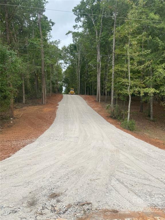 One of a kind tract of land (5 acres approximately). Build your dream
home, bring your horses, garden, or hang out by a fire pit. Great location in the county and yet only a few miles to
everything so it’s the best of both worlds. There is an easement and maintenance agreement for Lots 2, 3, 4. This lot has been perked.