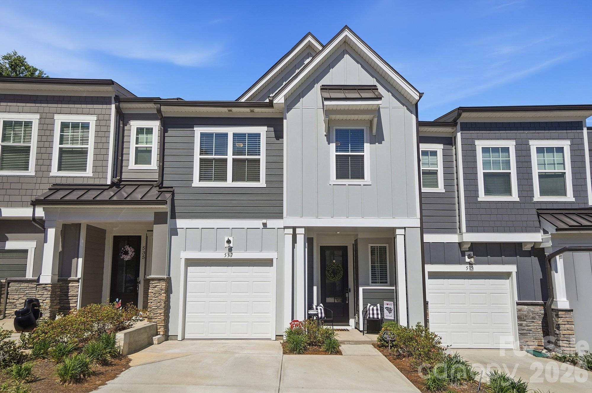 Beautiful and meticulously cared for 3-bedroom, 2.5-bath townhome located in the desirable Ashburn subdivision in Fort Mill. This inviting home offers an open floorplan filled with natural light and stylish upgrades throughout. The kitchen features upgraded white cabinetry, White Storm quartz countertops, stainless steel appliances, a large center island, and a generous walk-in pantry. Upstairs, the spacious primary suite offers a luxurious en suite bath with a custom tile shower and built-in bench, along with a walk-in closet with access directly to the upstairs laundry room. A versatile loft/sitting area, two additional bedrooms, and a full bath complete the second floor. Conveniently located near award-winning schools, shopping, dining, and with easy access to I-77, this home combines comfort, style, and convenience in one exceptional package.