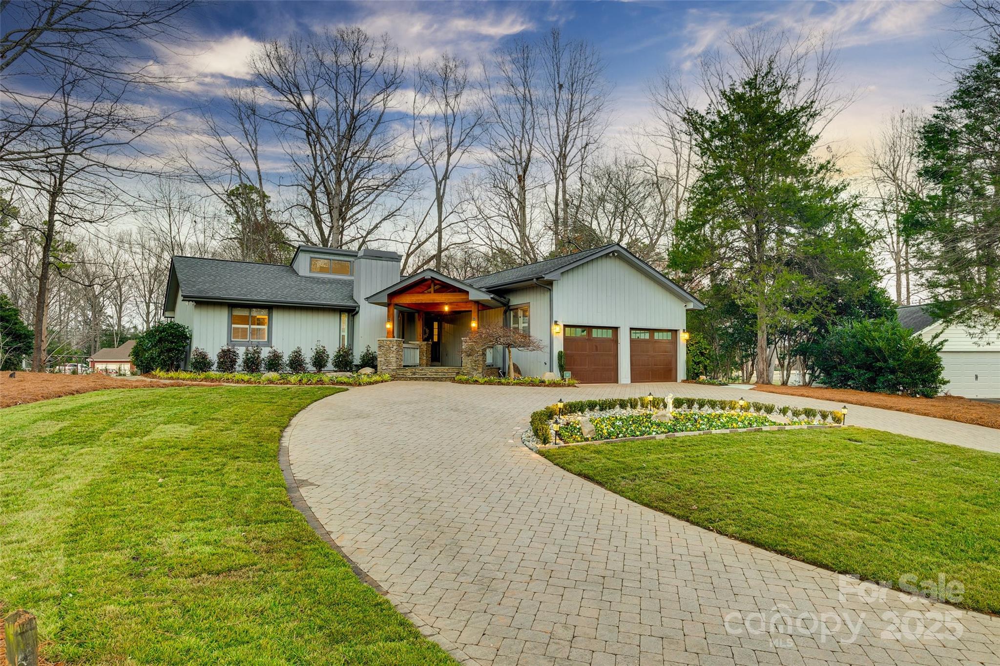Welcome to Resort Style Living in the sought after amenity rich neighborhood of River Hills.  Enter this beautiful Ranch style home with basement through the Country Club worthy entrance.  Check out the one of a kind Fire & Water feature in the backyard, expanded Deck & new professional landscaping with lighting.  The Kitchen is a cooks' dream with stainless steel KitchenAid appliances and tons of counter space.  Cozy up next to the fireplace in the living room & enjoy the gas logs, or swap them out for wood. Take an opportunity to relax in the updated Primary bathroom with soaking tub, fireplace and dual walk-in closets. The renovated downstairs offers a secondary Primary Suite with tile flooring, a functional kitchenette and door to your outdoor retreat.  Home has 2 new HVAC units with dehumidifier, new crawlspace encapsulation, insulation, Duct system, smart home technology, sprinkler system with Well and new tankless Gas Hot water heater.