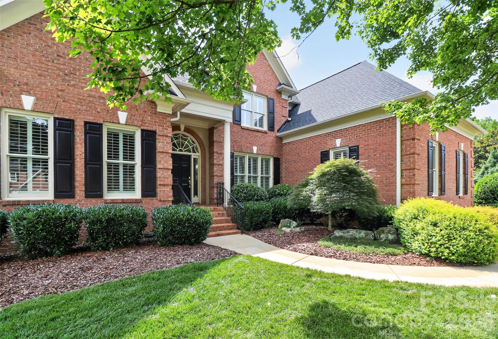 Nestled in the highly sought-after Kensington at Ballantyne community, this well appointed all brick home presents a rare opportunity to own an impeccably maintained original-owner home offering timeless elegance, exceptional living spaces and a resort-style backyard retreat!

This stunning 4 bedroom/3.5 bath residence welcomes you with beautiful hardwood floors, extensive molding and trim work that flow throughout the main level and continues upstairs, creating warmth and sophistication throughout. The thoughtfully designed main level offers a spacious office space, an elegant formal dining room, and a seamless flow ideal for both everyday living and entertaining. The kitchen features custom warm wood cabinetry, rich stone countertops, and stainless Kitchen Aid appliances, very large pantry blending functionality with refined style. The inviting living room is anchored by a beautiful gas fireplace and built in cabinetry.

The spacious floor plan also includes a luxurious main-level primary suite, offering a private sanctuary complete with an ensuite bath and a custom-designed walk-in closet that provides exceptional organization and storage.
The upper level is equally impressive, featuring three oversized secondary bedrooms, a beautifully renovated full bath and jack and jill with thoughtful updates, a massive bonus room with addition storage, and an expansive walk-in attic with loft area, providing abundant storage and endless possibilities for future expansion.
Let's head out back and discover your own private oasis! Designed for year-round enjoyment, showcasing a sparkling in-ground pool and an exceptional custom outdoor living area featuring a beautiful pergola and built-in stone fireplace and beautifully maintained mature landscaping. Hosting guests or enjoying a quiet evening at home, this outdoor retreat is designed to provide the perfect setting for entertaining and relaxation. Large 3 car garage.
This meticulously maintained residence combines luxury, comfort and an amazing location in one of Ballantyne’s most desirable neighborhoods, 6907 Meadow Run offers the opportunity to enjoy the very best of Ballantyne living! Enjoy close proximity to premier shopping and dining, The Bowl entertainment district, top-rated schools, parks and nearby corporate campuses. Come tour this wonderful very loved home Saturday 12- 3pm and Sunday 12-2pm.