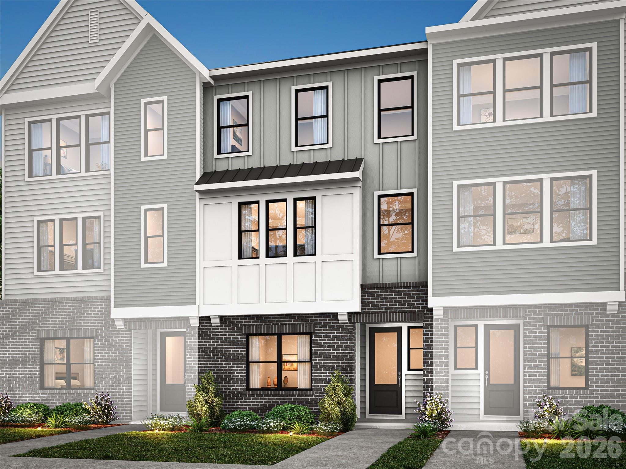 Life at Ross Farms places you in the heart of Ballantyne, close to top-rated schools, dining, shopping, and everyday conveniences. 6009 Yellow Buckeye Dr features the Bloom plan with bright, connected living spaces and the flexibility you are looking for. A GenSmart suite on the first floor offers a private bedroom, full bathroom, and living room, ideal for guests or multigenerational living. Open rails at the stairs create an airy, modern feel, while the gourmet kitchen showcases white surround cabinetry, a Benton Seaboard warm brown cabinet island, Liberty Gold white quartz countertops, a GE 36" gas cooktop, and a 3x12 Mesmerist Trance Gloss herringbone backsplash. A Convenience package adds roll trays, a base waste basket, and upgrades from standard to select-level cabinet construction, while upgraded built-in pantry shelving provides added organization. The primary suite features Benton Seaboard warm brown cabinetry, white quartz countertops, a shower with a built-in seat and fully tiled walls and floor pan, plus a walk-in closet with upgraded built-in wood shelving. The secondary bathroom adds tile above the tub. A 12-foot wide, 8-foot tall sliding glass door connects the second-floor great room to a covered outdoor living space, and an 8-foot garage entry door creates a striking arrival.