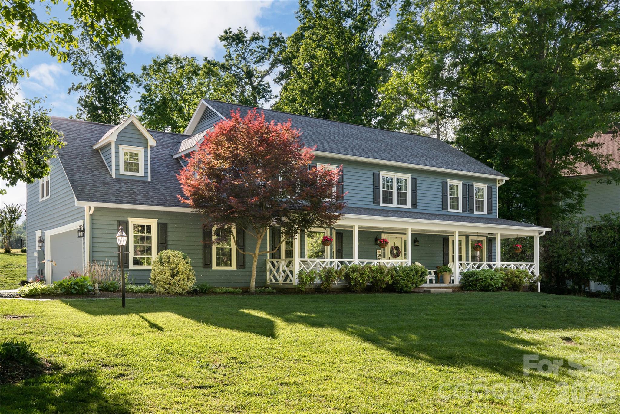 Seller is offering a $7,500 buyer credit at closing. Tucked away in the trees yet just minutes from everything Asheville has to offer, this stunning mountain retreat blends privacy, luxury and natural beauty in one unforgettable setting. On a peaceful wooded homesite, 43 Treetop Drive offers the ideal balance of modern comfort and serene mountain living. Expansive windows flood the home with natural light while framing breathtaking views of the surrounding landscape. Inside, you’ll find thoughtfully designed living spaces with warm finishes, a floor plan that transitions effortlessly and seamless indoor-outdoor flow ideal for everyday living and entertaining. The spacious kitchen opens beautifully to the main gathering areas, while multiple outdoor spaces invite you to relax, dine or unwind among the trees. The primary suite serves as a retreat with an office/bonus room attached, and three additional bedrooms and flexible living spaces provide room for guests, work or recreation. A rare opportunity to own a private wooded escape with style, comfort and convenience, all in one exceptional property.