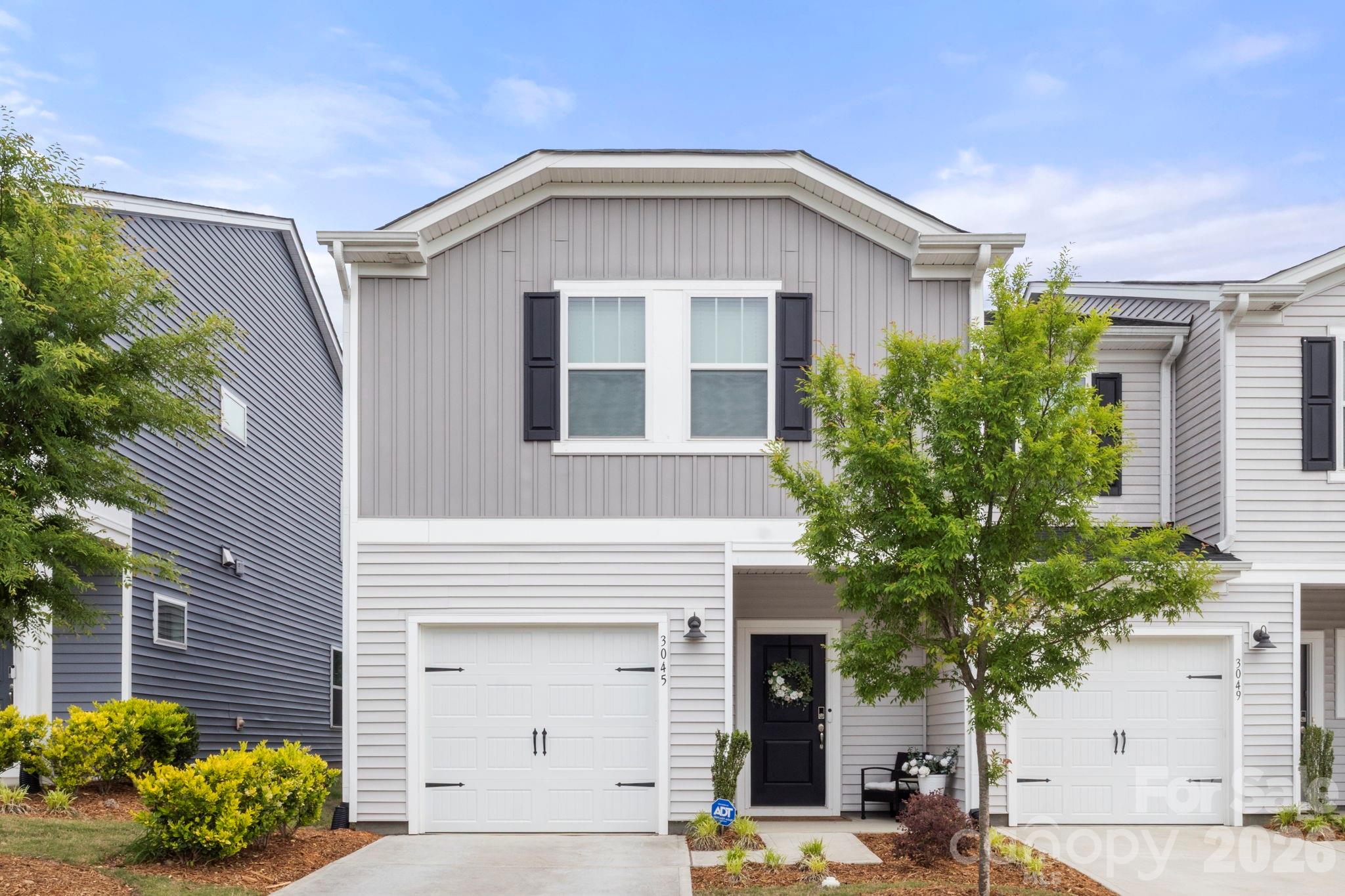Why wait for new construction when you can move right into this beautiful 3-bedroom, 2.5-bath townhome built in 2023, located in the vibrant Belterra community in northwest Charlotte? This energy-efficient, two-story home offers modern design, functional living spaces, and low-maintenance convenience, without the wait. Step inside to discover a thoughtfully designed layout featuring spacious living and dining area, ideal for both everyday living and entertaining. Enjoy a more private setting with peaceful natural views—offering a sense of retreat that’s hard to find in townhome living. Upstairs, you’ll find a versatile loft—perfect for a home office, media space, or play area—along with well-appointed bedrooms, including a comfortable primary suite with a private bath. Even better—the washer, dryer, and refrigerator all convey, making this home truly move-in ready. Belterra is known for its energy-efficient homes designed to provide greater savings, improved comfort, and peace of mind. Residents enjoy a low-maintenance lifestyle along with community amenities, including a playground for outdoor enjoyment. Location is everything, and this home delivers—just 14 minutes to Charlotte Douglas Airport, 5 minutes to Riverbend Village, 12 minutes to Northlake Mall and Uptown Charlotte, offering endless options for shopping, dining, and entertainment. Commuting is easy with quick access to I-485, Hwy 16, and nearby schools. Skip the build time, this like-new home is ready for you today.