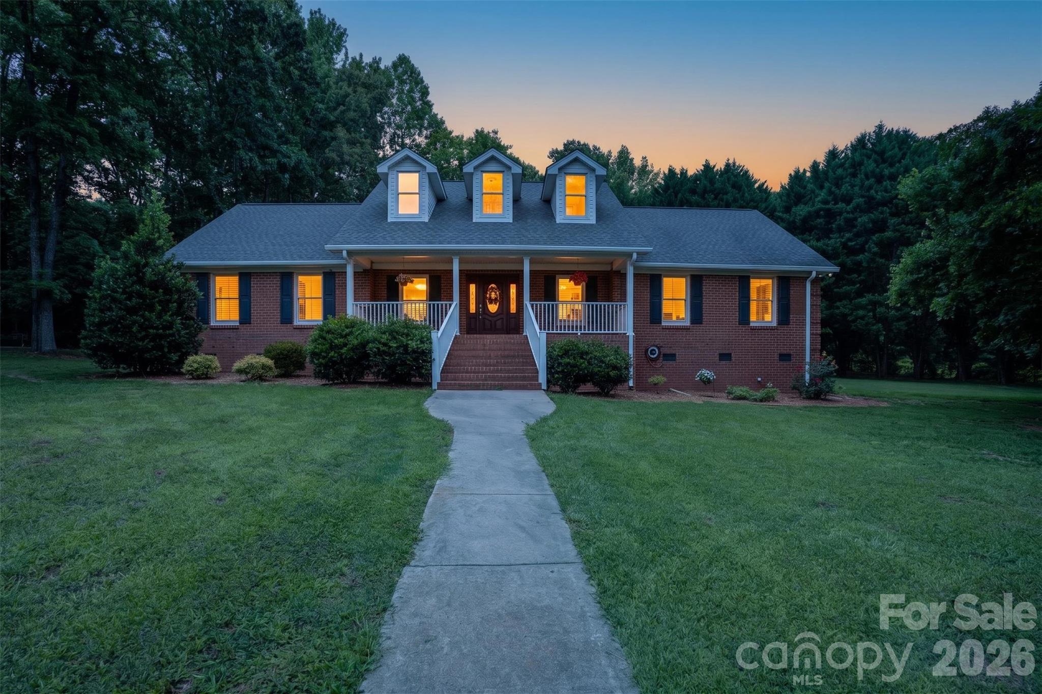 OFFERING $10,000 IN SELLER CONCESSIONS.....Welcome home to this beautiful brick ranch situated on 3.47 peaceful acres! This spacious 2,128 sq. ft. home features 3 bedrooms and 2.5 baths with a desirable split floor plan offering both comfort and privacy.

Step inside to find gorgeous hardwood floors throughout, an inviting open kitchen area, and a wet bar that is perfect for entertaining family and friends. The layout offers plenty of space for everyday living while still feeling warm and welcoming.

Outside, enjoy room to roam with a four-stall horse barn, making this property ideal for horse lovers, hobby farmers, gardening or anyone looking for a little extra space in a country setting. Be with in minutes of down town shopping with acreage, charm, and functionality all in one, this brick ranch is a must-see!