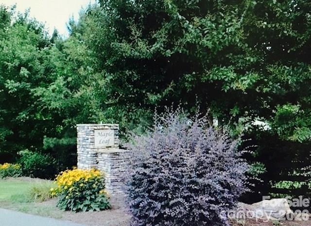 PRICE REDUCED!! OVER HALF ACRE LOT in quiet established neighborhood. Nicely wooded lot in Cul-de-sac. Maple Leaf Subdivision is a much sought after neighborhood of custom build homes. Peaceful neighborhood. Great location with easy access to shopping, schools, dining, etc. SOIL TEST DONE (good until 2027) and is attached. North Lincoln School District. Septic needed, County water (tap fee required). Bring your own builder or contact LA for reputable local custom home builder. CCR's attached. 2000 sq ft min to build w/basement, 2200 sq ft min w/o basement.