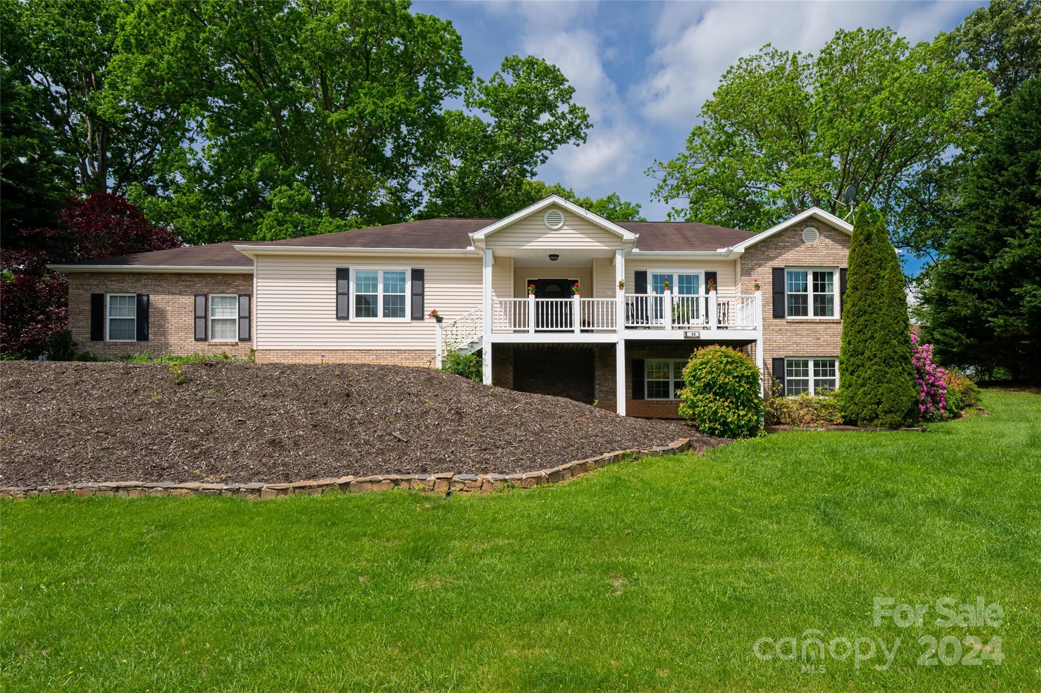 *Highest and best by Monday, May 27 at 5pm*  Welcome to your dream home. This beautiful property offers the perfect blend of modern luxury and serene natural surroundings of the Blue Ridge Mountains. Step inside this impeccably designed home and be greeted by spacious open-concept living areas flooded with natural light. The new gourmet kitchen features high-end appliances, quartzite countertops, and beautiful cabinetry, making it a chef's delight. Relax and unwind in the luxurious master suite complete with a spa-like ensuite bathroom and overlooking the breathtaking mountain views. Additional bedrooms provide ample space for guests and beautiful new tile and fixtures in the guest bathroom. Enjoy the outdoors on the expansive deck and sunroom, perfect for al fresco dining or simply soaking in the tranquil surroundings. Large fenced in yard for your furry friends too. House boasts a full unfinished basement with half bath ready for you to finish house. This one will not last long!
