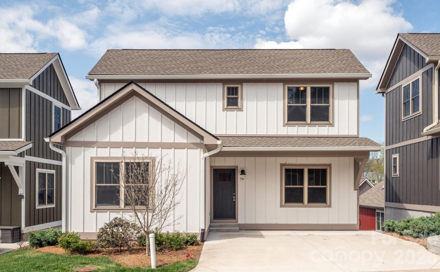 Discover the perfect blend of modern comfort and meaningful community in this beautifully crafted new-construction home. Offering 3 bedrooms and 2 bathrooms, this thoughtfully designed residence features a practical open floor plan ideal for everyday living. The primary suite on the main level adds ease and convenience, making the home well-suited for a variety of lifestyles. Step out onto the back deck and take in serene mountain views—an inviting space for morning coffee or evening relaxation. Set within a carefully planned neighborhood, this home is part of a community that truly prioritizes connection. Designed to foster relationships between neighbors while also supporting comfortable, functional living inside the home, this setting is especially well-suited for multigenerational living. Residents enjoy a dog-friendly atmosphere, complete with a dedicated dog park, making it easy for pets and their people to feel right at home. Located just moments from Karpen Park and approximately one mile from the charming shops, dining, and events of downtown Weaverville, convenience meets tranquility in this ideal location. USDA-approved, this home also offers an accessible path to homeownership for qualified buyers. Experience a place where thoughtful design meets a genuine sense of community—this is more than a home, it’s a lifestyle.