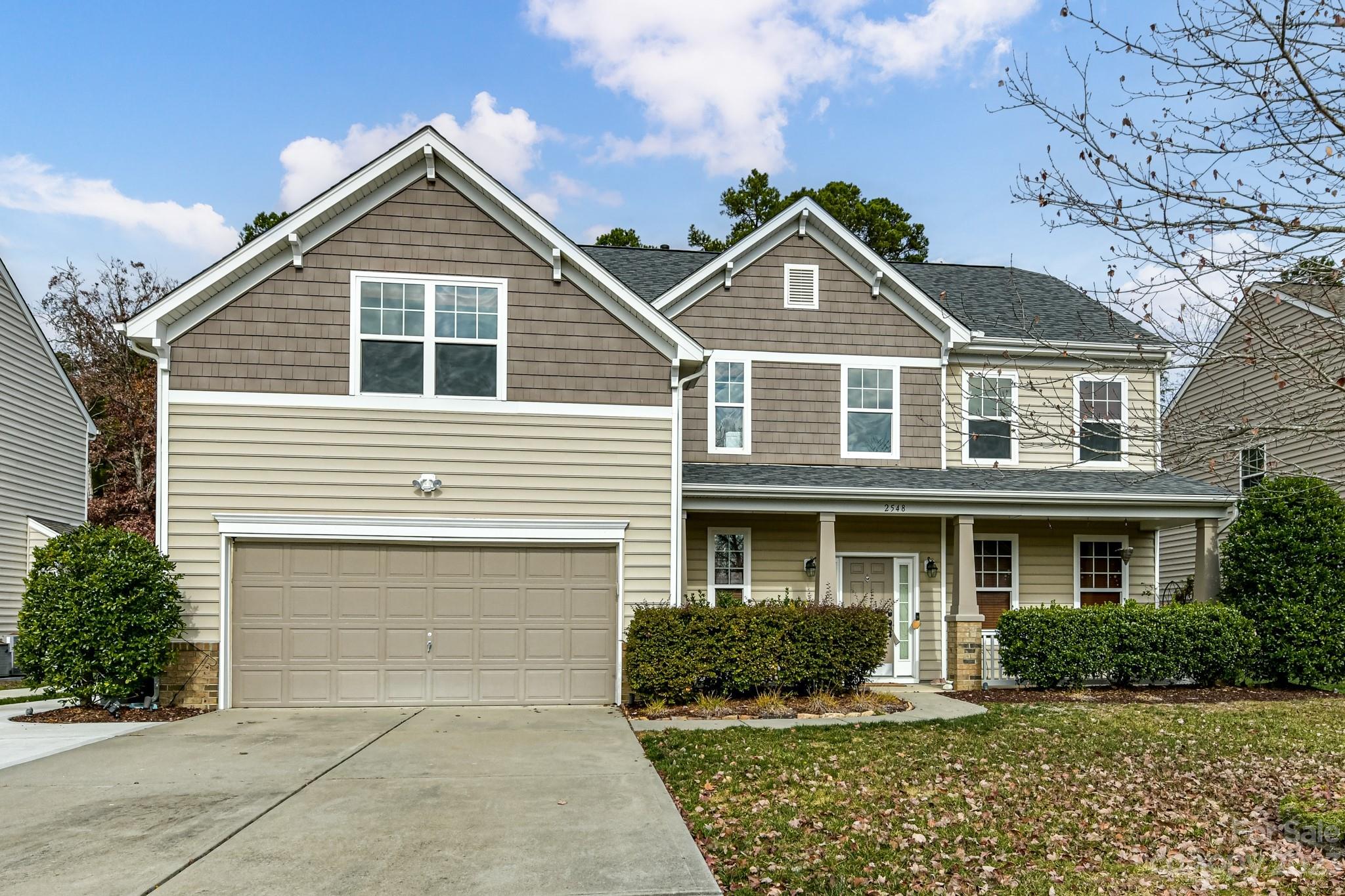 Discover this immaculately maintained home nestled in sought-after Wellington Chase. Step into a charming covered porch leading to a spacious layout ideal for hosting gatherings. Enjoy a warm family room with a fireplace seamlessly connected to a gourmet kitchen featuring a sprawling granite island, tiled backsplash, stainless steel appliances, and ample cabinetry. The serene owner's retreat, secluded from other bedrooms, offers a tray ceiling, dual walk-in closets, a generous bath with a soaking tub, separate shower, and double vanities. An expansive vaulted bonus room adds versatility as a bedroom, office, play area, or media space. Outside, a private backyard oasis awaits with a substantial patio, tranquil treeline views, and a fully fenced yard complete with a full irrigation system. Community perks include a clubhouse, playground, outdoor pool, and tennis/basketball courts. Conveniently located near top-rated schools, shopping, dining, and easy access to I-85/I-77.