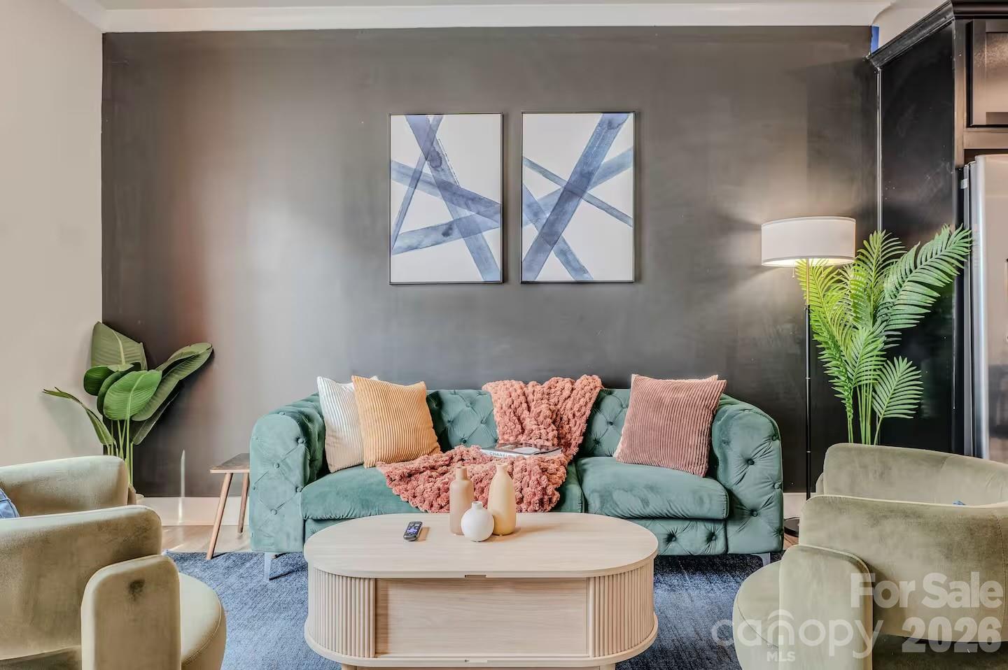 Experience modern urban living in this stunning four-level townhome located in the heart of Charlotte. Thoughtfully designed with contemporary finishes and an open-concept floor plan, this 3-bedroom, 3.5-bath home offers the perfect blend of style, comfort, and functionality. The spacious main living area is ideal for entertaining, featuring a beautifully appointed kitchen with sleek cabinetry, stainless steel appliances, generous counter space, and seamless flow into the dining and living areas. Each bedroom offers privacy and comfort with its own well-designed layout, while the multiple levels provide flexible living spaces to fit your lifestyle. The top floor is a true highlight, featuring a private rooftop terrace - perfect for slow coffee mornings, outdoor dining, or unwinding after a long week under the Carolina sky. Ideally situated just minutes from Camp North End, the Skyla Credit Union Amphitheater, 2 miles from Uptown Charlotte, NoDa, and major commuter routes, you'll enjoy convenient access to some of Charlotte's best restaurants, breweries, entertainment, shopping, and employment centers. This move-in-ready townhome offers low-maintenance living in one of Charlotte's most desirable and rapidly growing locations.