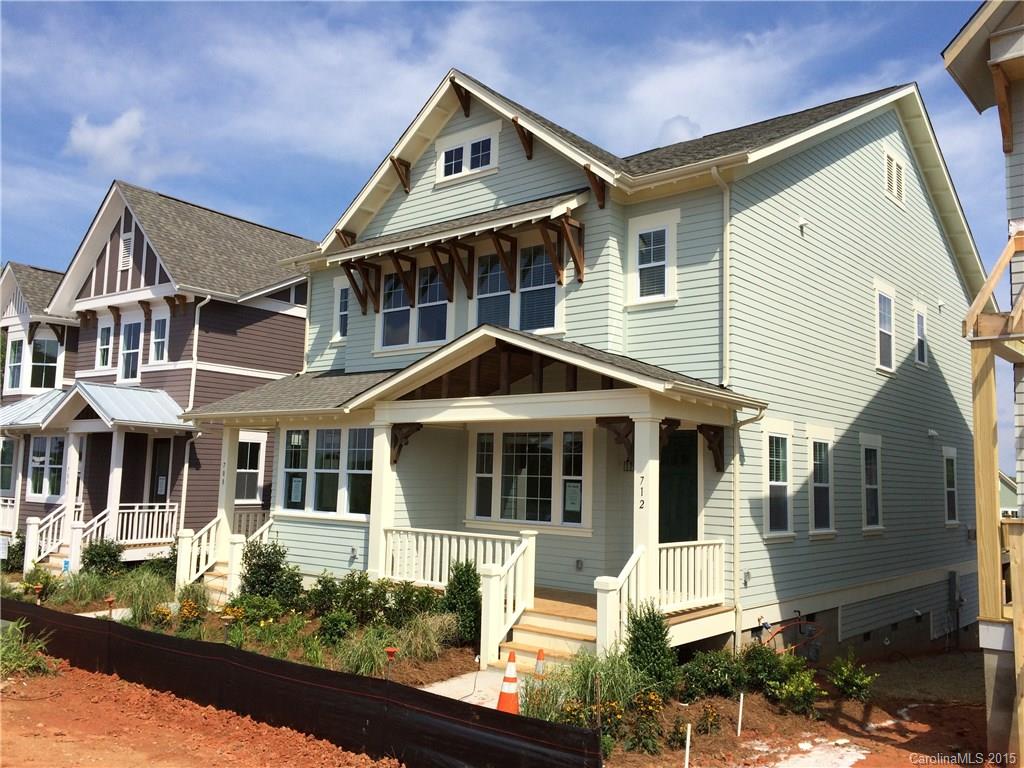 Exciting new Energy Star Guaranteed Twin Townhome built in 2014 with fantastic selections! Featuring open design w/ an abundance of windows, a spacious study on main level, master up, site-finished hardwoods on the entire main level & staircase, fireplace, ceramic tile floors in baths & laundry area, granite countertops in kitchen w/ subway tile backsplash, under-cabinet lighting, gas range, 2-car parking pad in rear & floored storage area underneath home accessed by a full-size door.