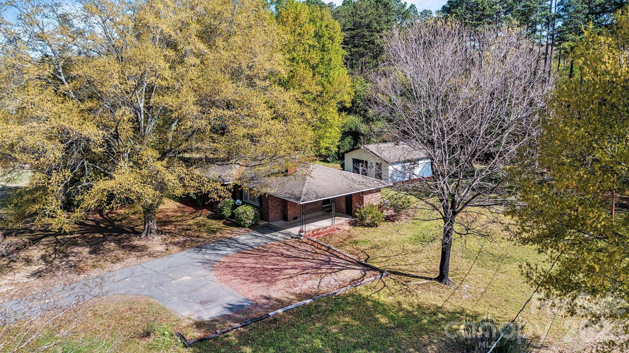$10,000 Seller Credit offered to help buy down your mortgage rate or closing costs with acceptable offer!!  Need space for your tools, toys, projects, or business? This updated home sits on nearly 2 acres and comes with a detached workshop/garage, plenty of parking, and room to spread out. Inside you'll find fresh updates, hardwood floors, updated paint, and move-in-ready living. Whether you're looking for a place to work, build, store equipment, or simply enjoy a little elbow room, this property offers flexibility that's hard to find at this price point. No cookie-cutter neighborhood. No wasted space. Just land, a workshop, and a turnkey home ready for its next owner.
A charming blend of land, functionality, and versatility — all within convenient reach of Lake Norman, Denver, Lincolnton, and Charlotte.