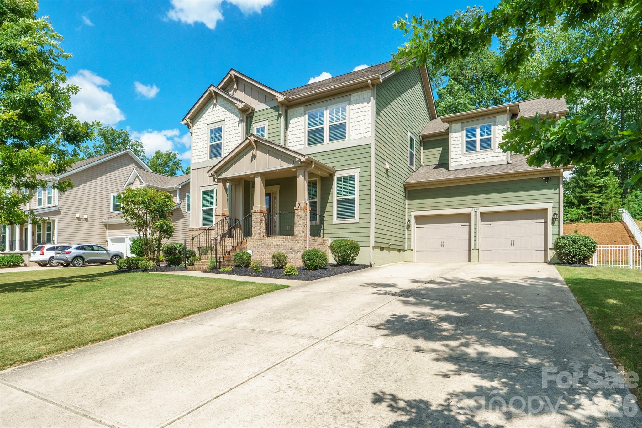 Welcome to Lawson, where classic curb appeal, comfortable living spaces, and great outdoor areas come together. The Fenton plan has an open layout with hardwood floors, an office, a big bonus room, and a kitchen that’s truly the heart of the home. The large kitchen island is perfect for gathering, and you’ll enjoy stainless-steel appliances, double convection ovens, a gas cooktop, and granite countertops that make cooking and entertaining easy. The great room is ideal for relaxing or spending time with family and friends. Upstairs, the owner’s suite has a roomy bath and a walk-in closet, while the other bedrooms offer flexible space for guests, work, or play. Step outside to a screened deck for your morning coffee or quiet evenings, and a paver patio with a fire pit that’s perfect for cookouts, cool fall nights, and weekend get-togethers. This home is in the popular Lawson neighborhood, which has resort-style amenities like trails, a pool, tennis courts, a playground, and a clubhouse. It’s a comfortable, connected place that’s ready for you to enjoy.