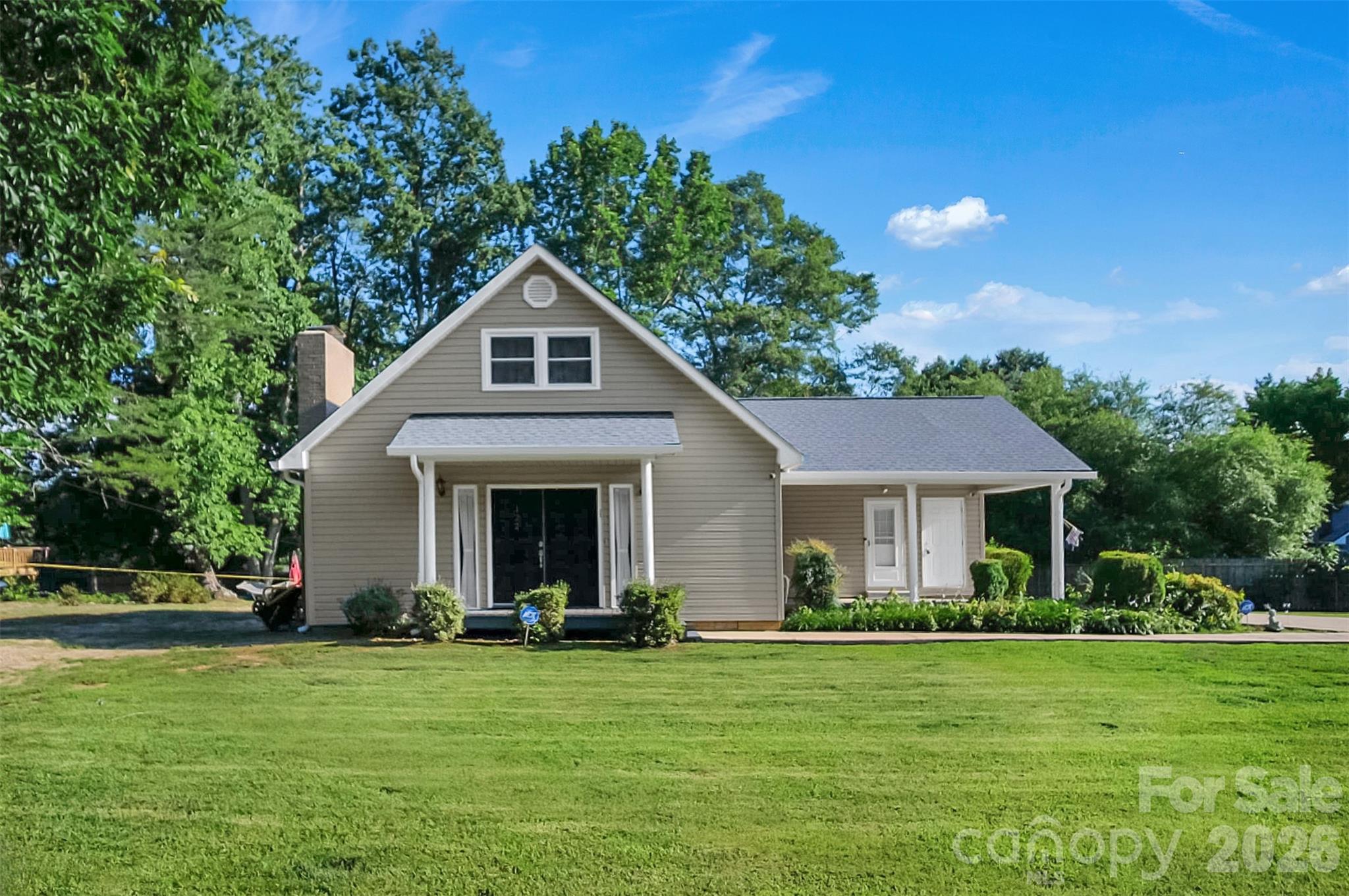Charming 3-bedroom, 2-bath home offering 1,374 sq ft of comfortable living space on a generous 0.51-acre lot. Enjoy peace of mind with major recent updates, including a **new HVAC system installed in 2025** and a **new roof, gutters with gutter guards, and downspouts installed in 2026**, providing enhanced efficiency, protection, and low-maintenance living for years to come.

Inside, the inviting living room features a cozy fireplace with propane gas logs, creating a warm and welcoming atmosphere. The updated eat-in kitchen showcases granite countertops, stainless steel appliances, and modern finishes. The home offers three bedrooms, including one conveniently located on the main level with a full bathroom just steps away.

Step outside to enjoy the Trex deck—perfect for relaxing, grilling, or entertaining guests. Additional features include a 1-car carport and a spacious yard with plenty of room to enjoy the outdoors. This well-maintained home combines modern updates, comfort, and value in one attractive package.