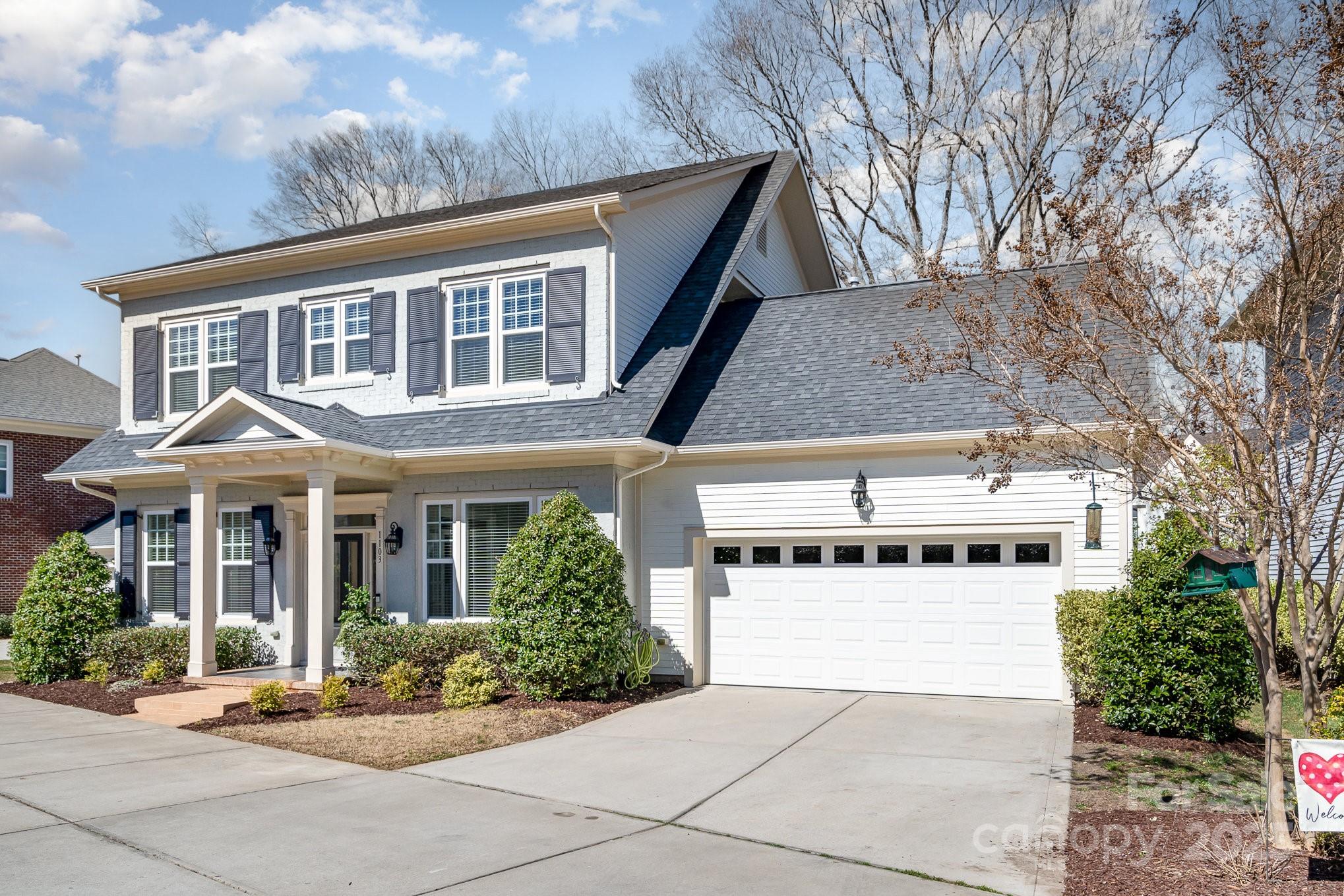 Discover your dream home at 1103 North Sharon Amity Road in Charlotte's coveted Cotswold neighborhood. This stunning 3,343 sq ft gem offers an open-concept layout with 10-foot ceilings and elegant hardwood floors. The gourmet kitchen is a culinary haven, featuring stainless steel appliances, a gas cook top, sleek quartz countertops, and a spacious island with seating. Relax in the family room by the gas fireplace or entertain in the dining area. The main-level primary suite includes two walk-in closets and a luxurious ensuite bath. A conveniently located laundry room & walk in pantry completes the main level. Upstairs, discover 4 additional bedrooms, 3 full baths, and abundant storage with walk-in and pull-down attic spaces. Enjoy the screened-in porch and expansive back patio, surrounded by mature landscaping and a fenced yard as well as an attached 2 car garage. Don't miss this exceptional property—schedule a showing today!
